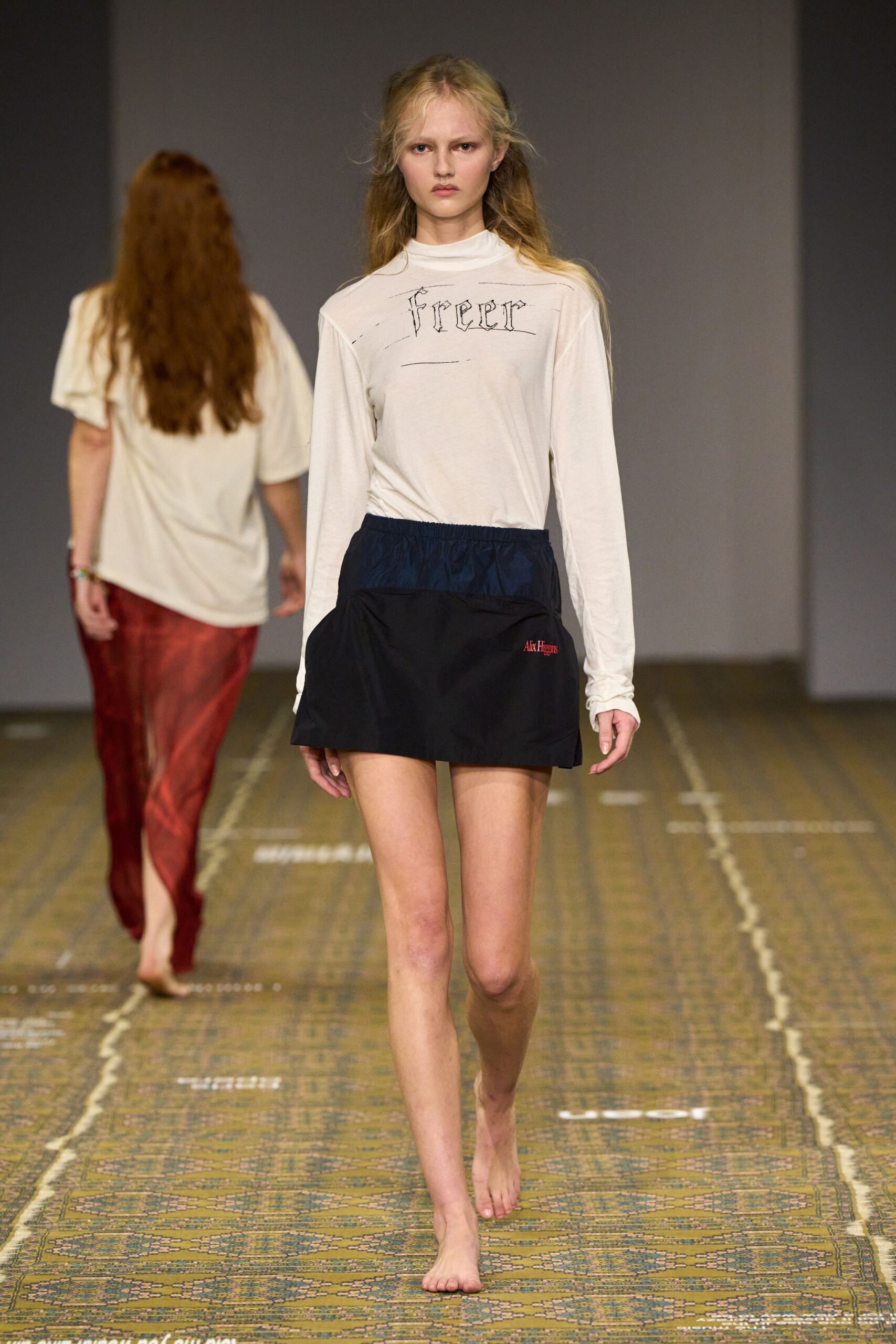 white printed top with mini skirt
