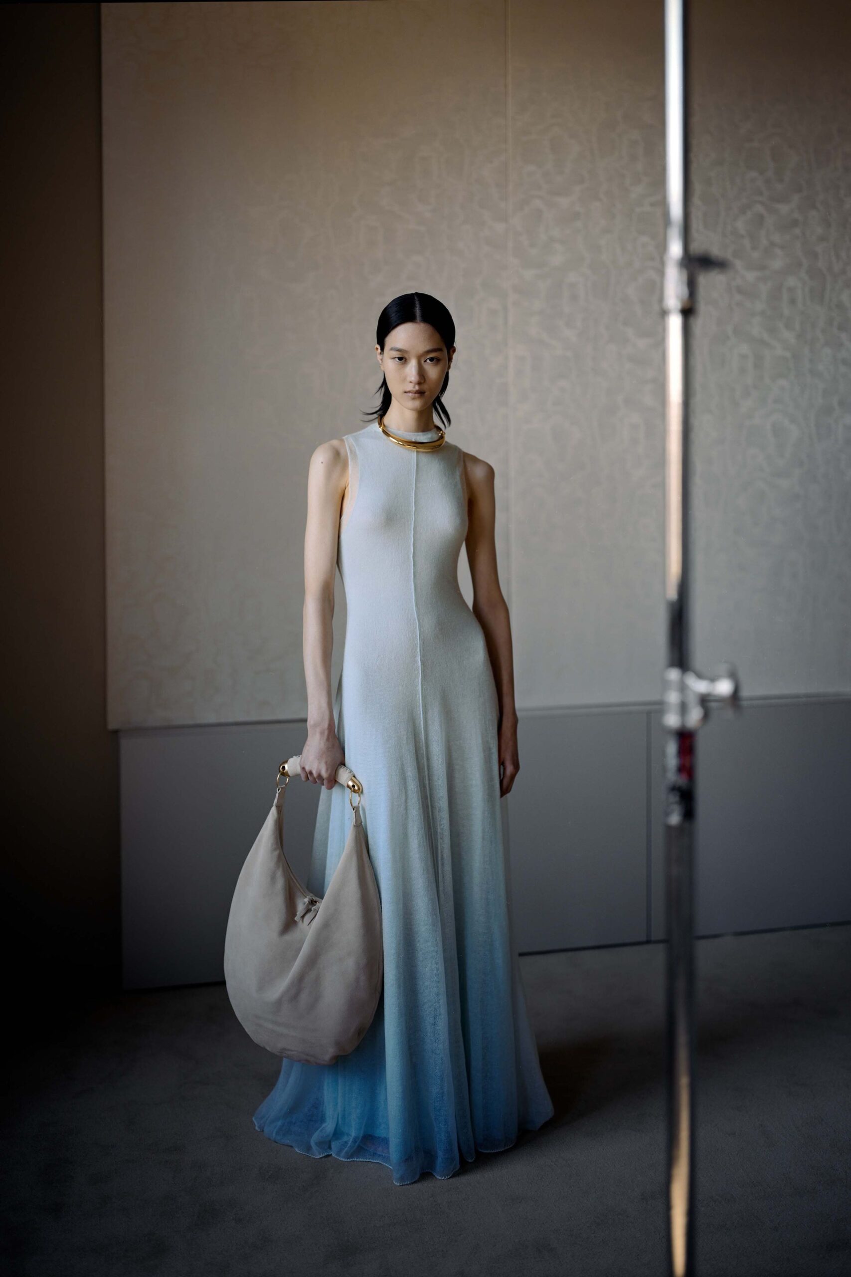 blue silk sleeveless gown