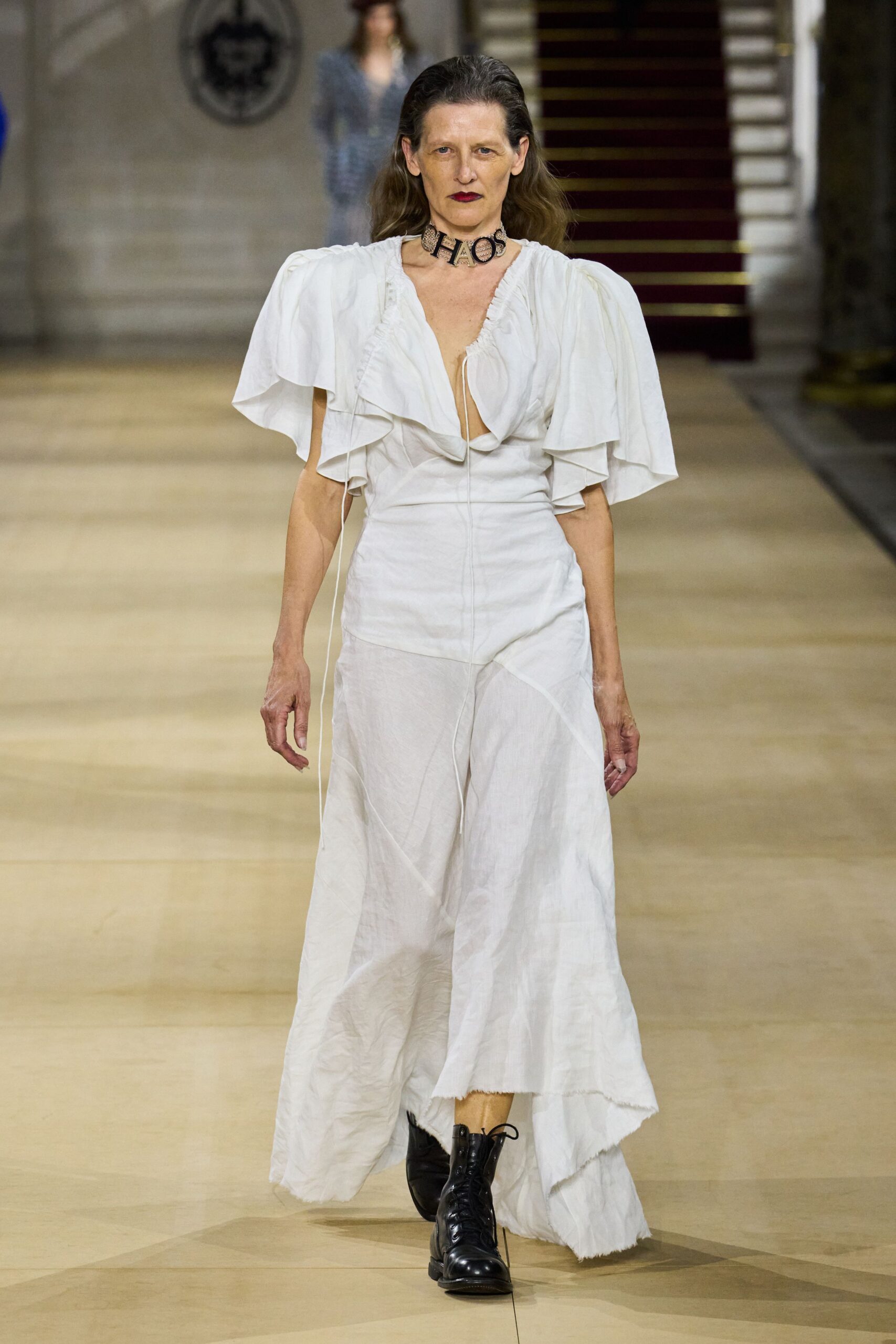 white pleated maxi dress with black boots