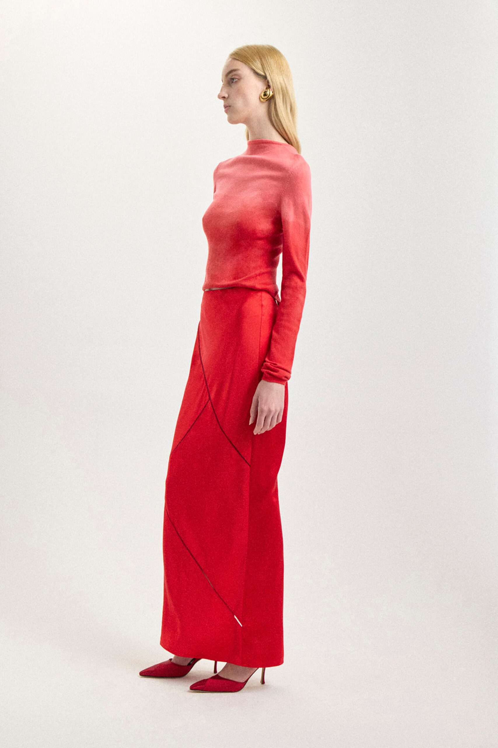 red silk long-sleeve high-neck fitted draped top