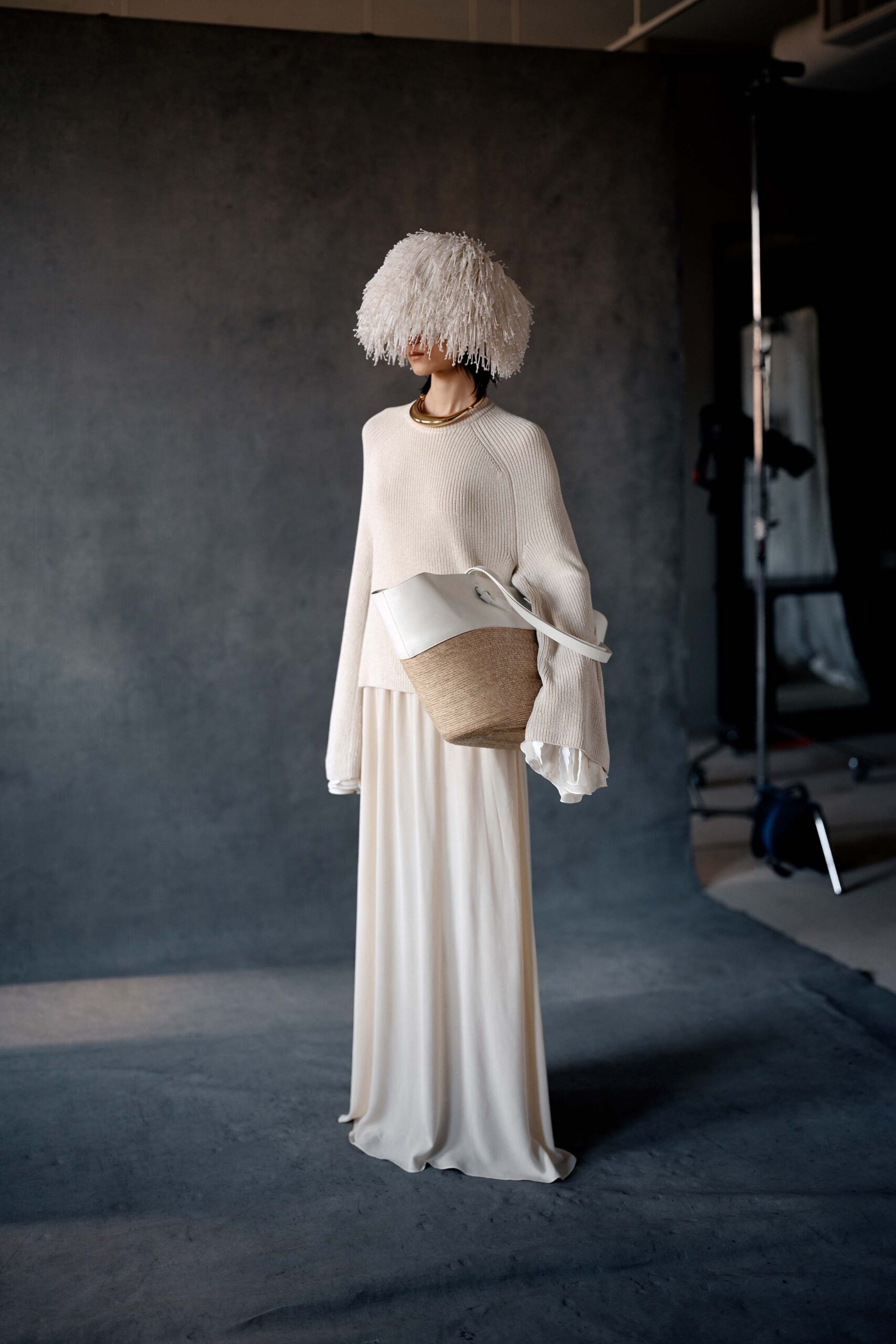 white relaxed sweater and gown