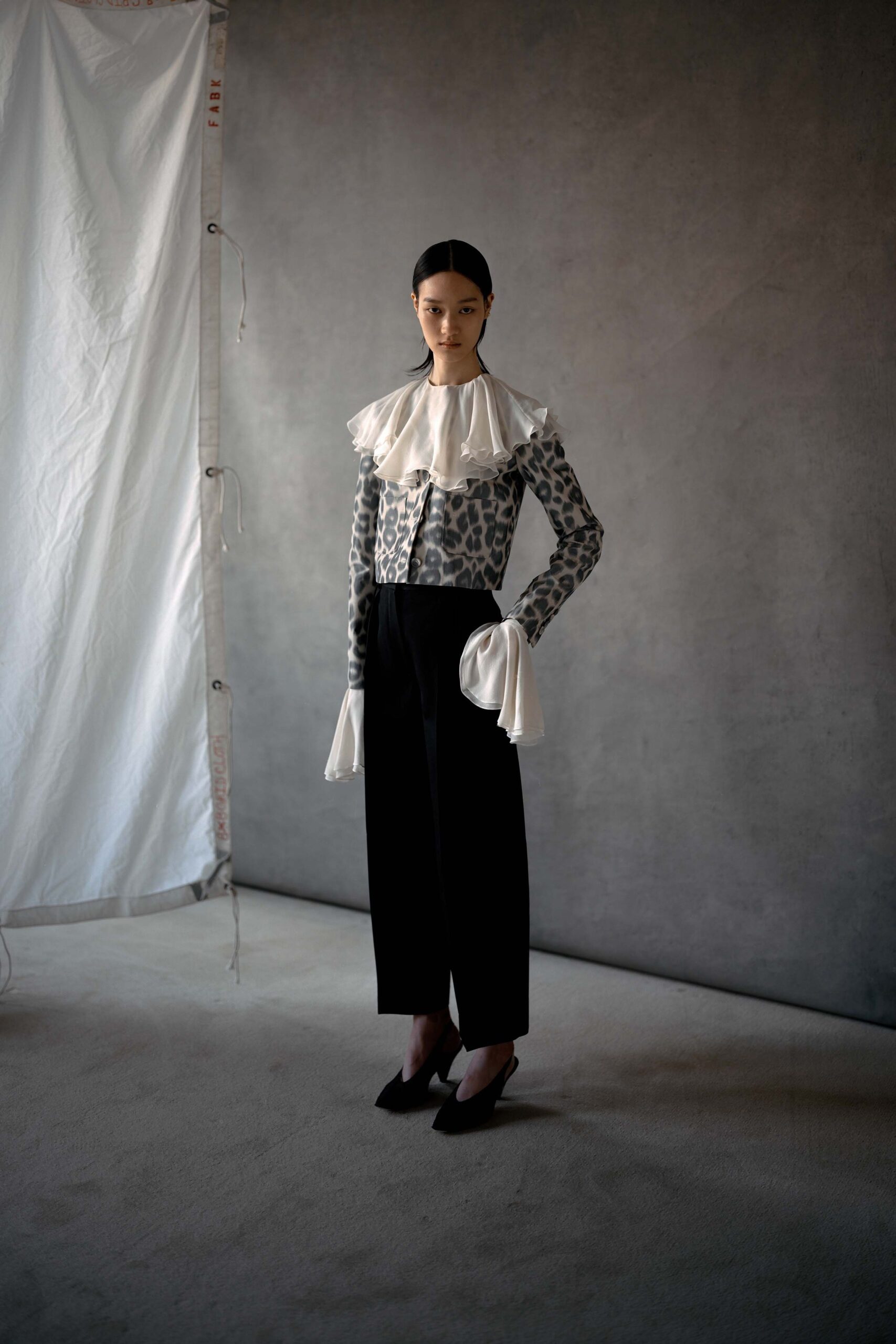 gray silk long-sleeve collared fitted ruffled printed blouse