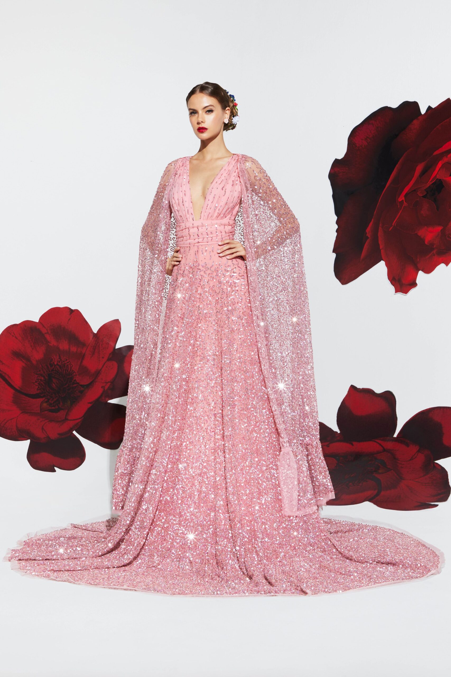 pink sequined gown with cape