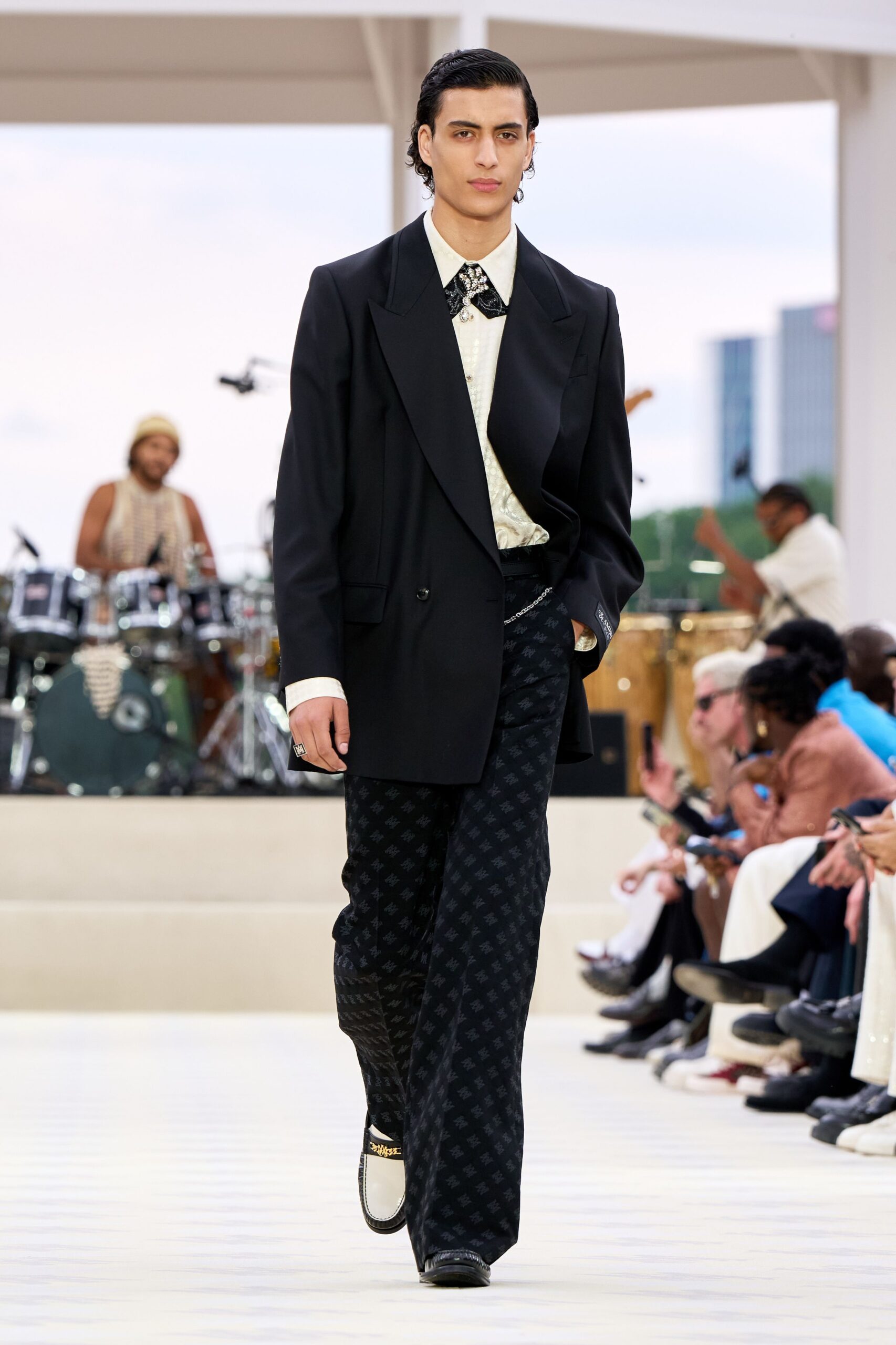 black blazer white shirt printed pants