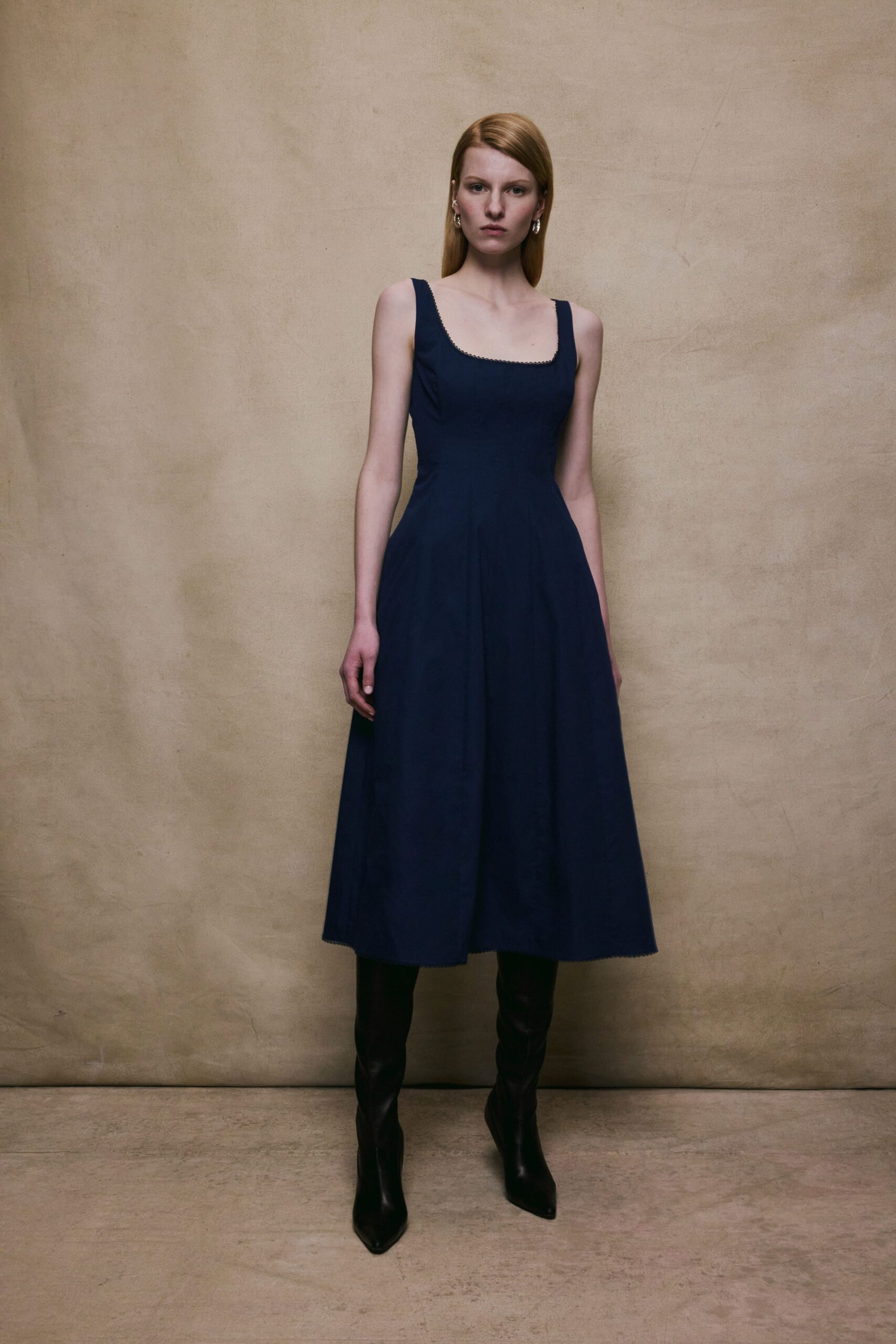 blue cotton sleeveless midi dress with black boots