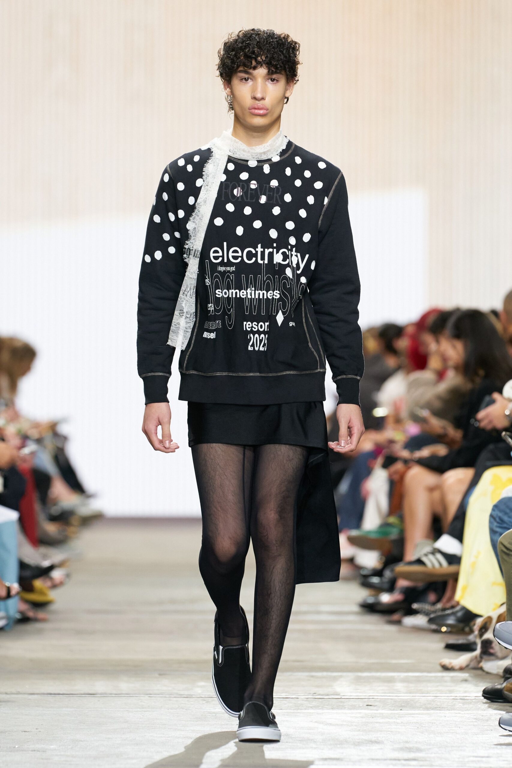 black printed sweater and mini skirt