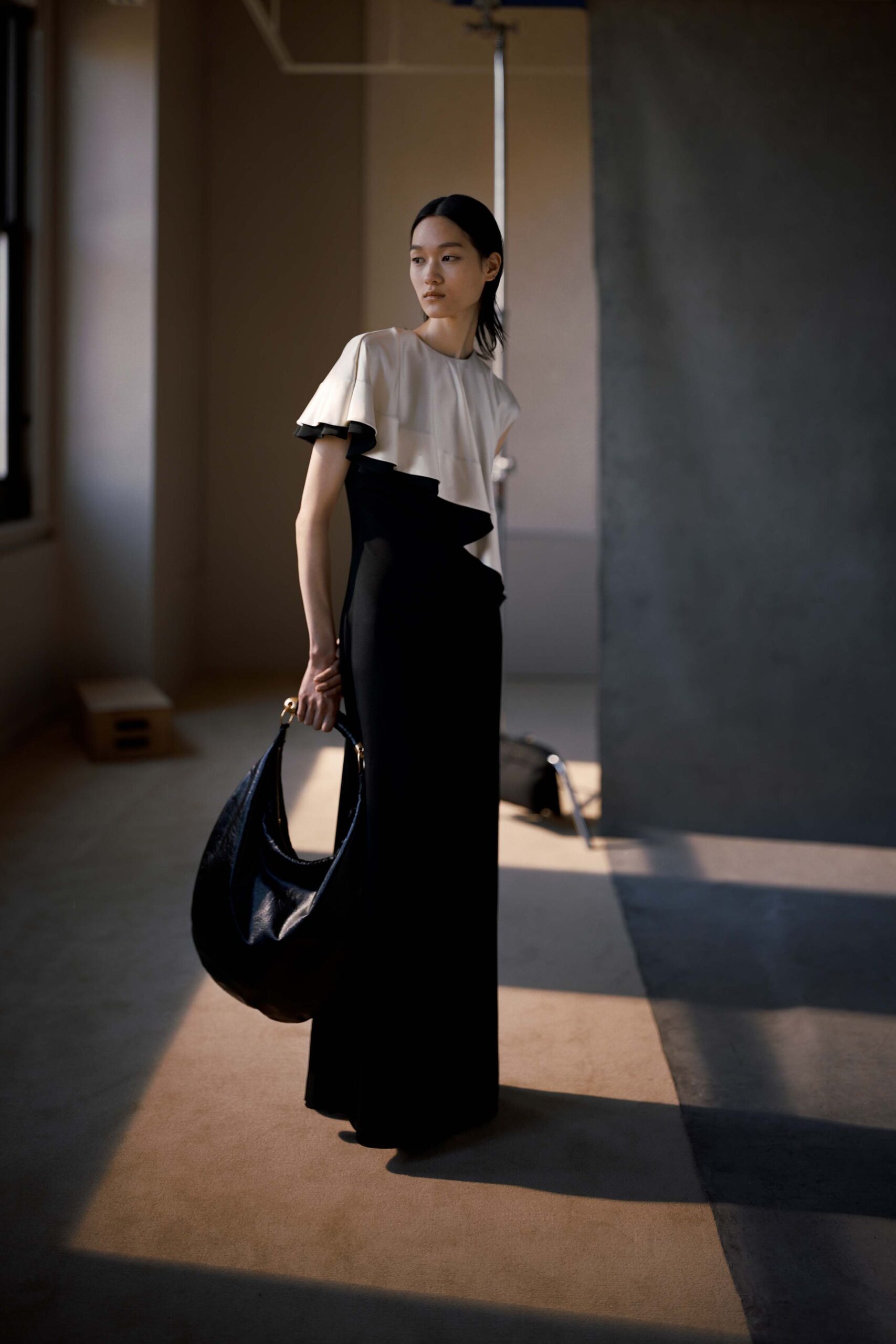 black and white ruffled maxi dress with bag
