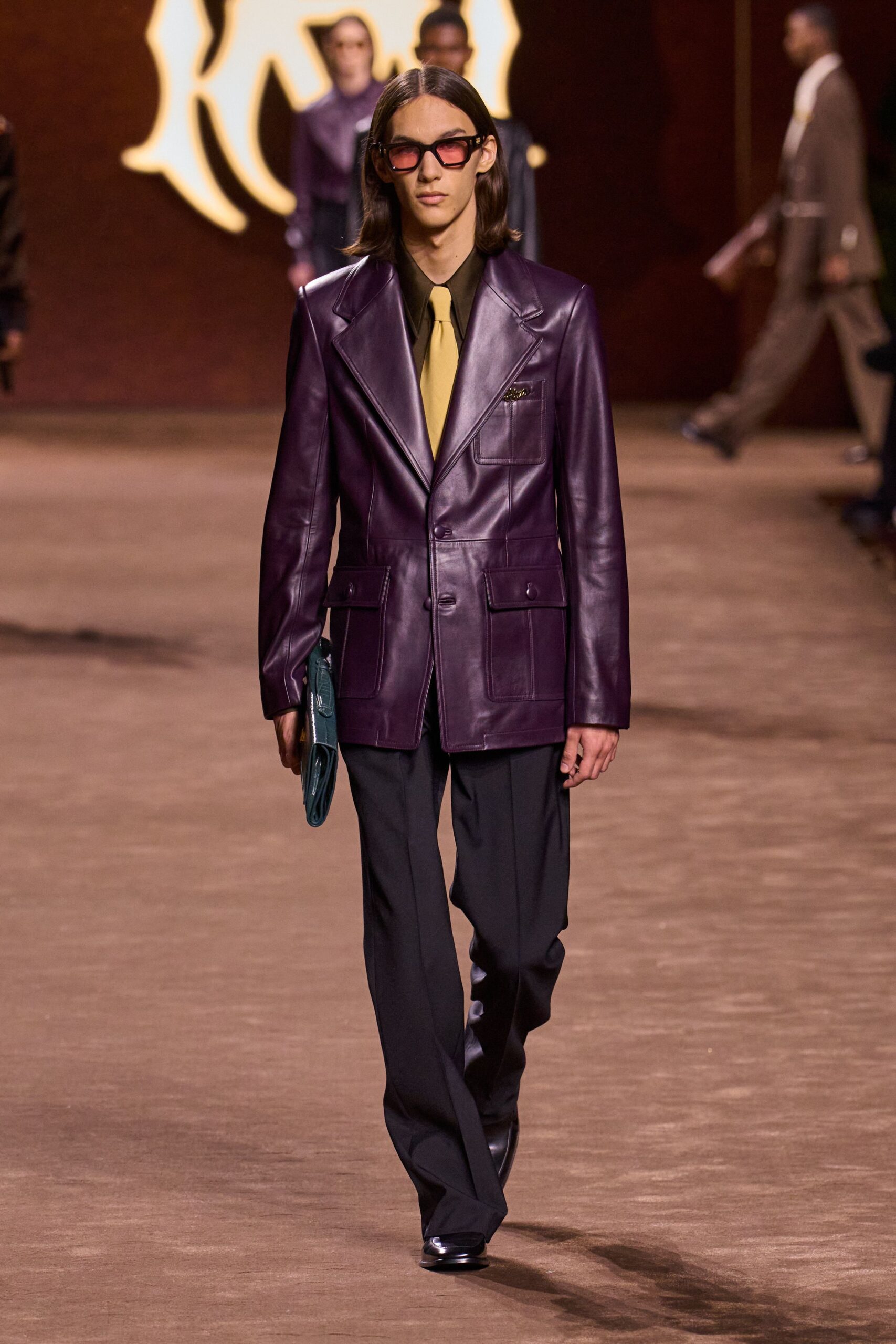 purple leather blazer with yellow shirt