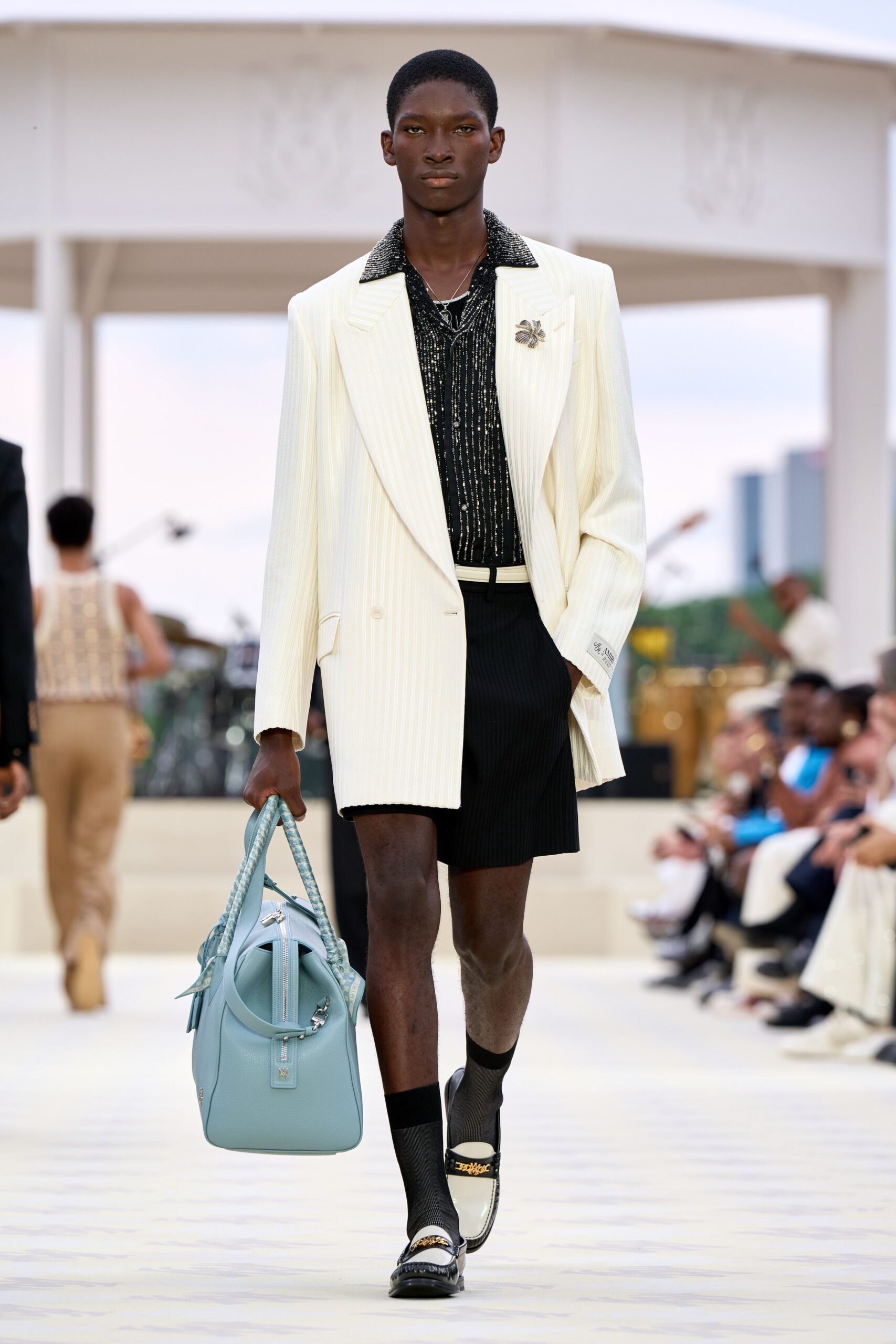 white tailored blazer with black shirt