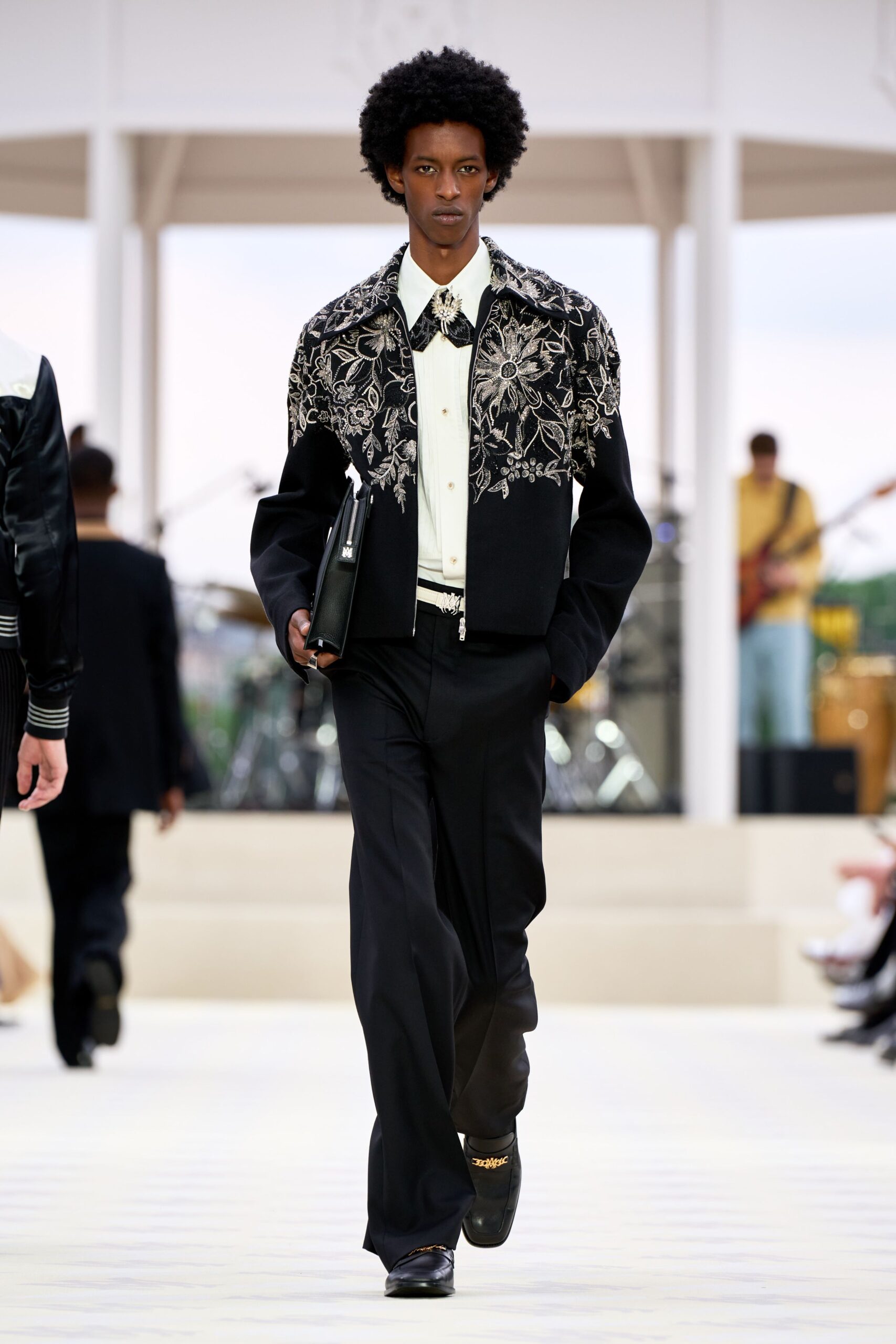 black embroidered jacket with white shirt