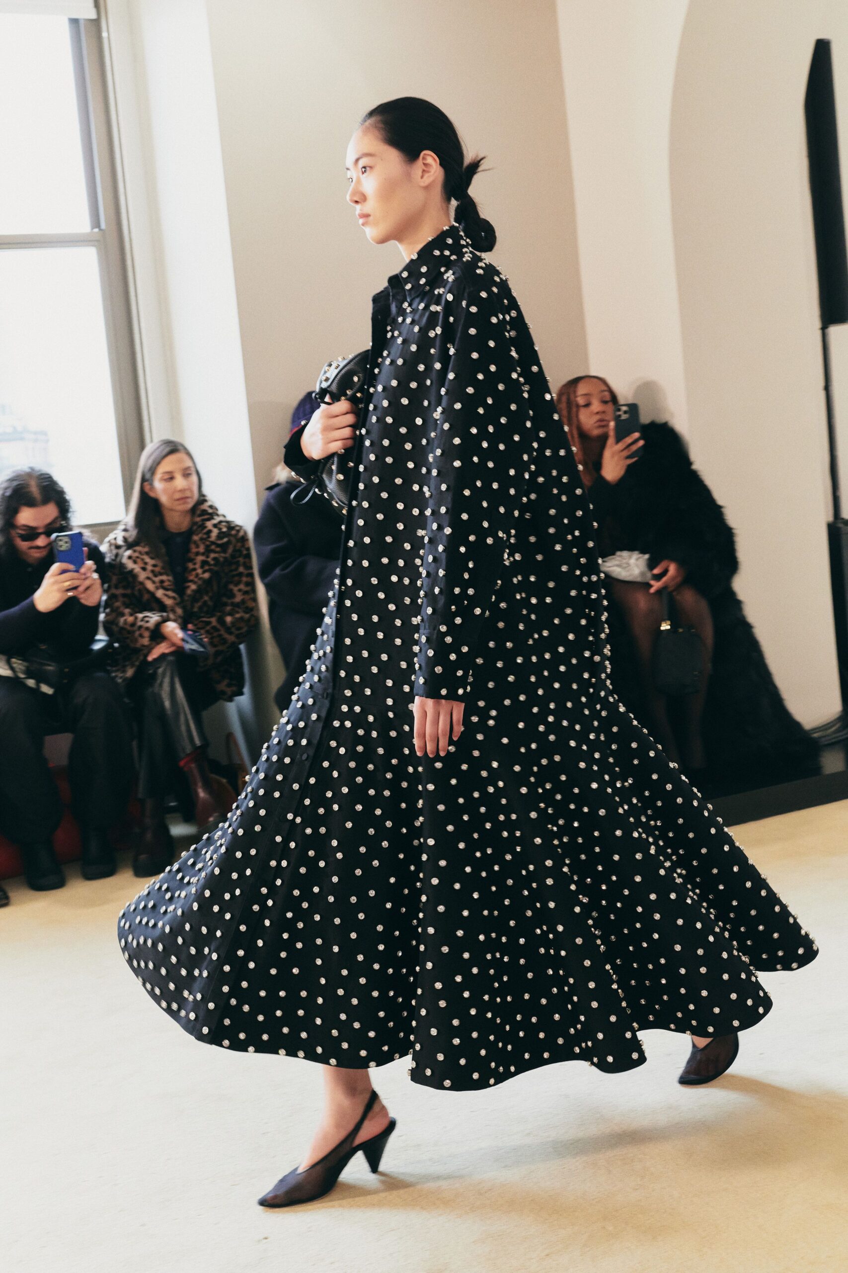 black cotton long-sleeve collared fitted polka-dot tiered dress