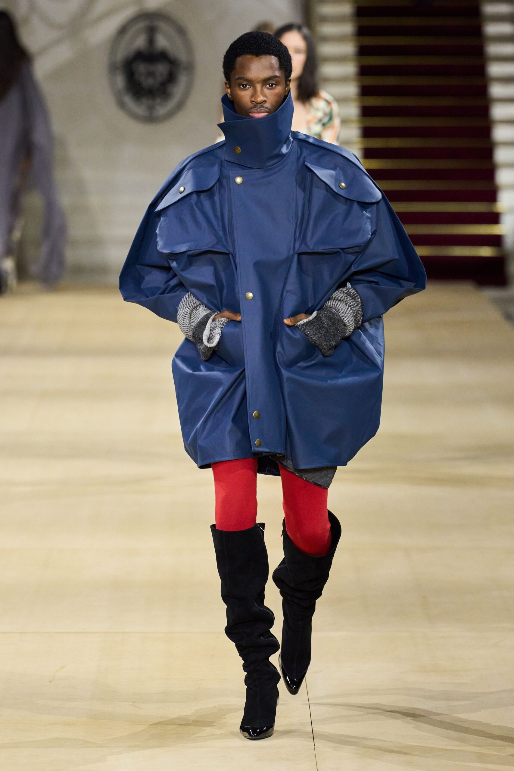 oversized blue coat with red pants
