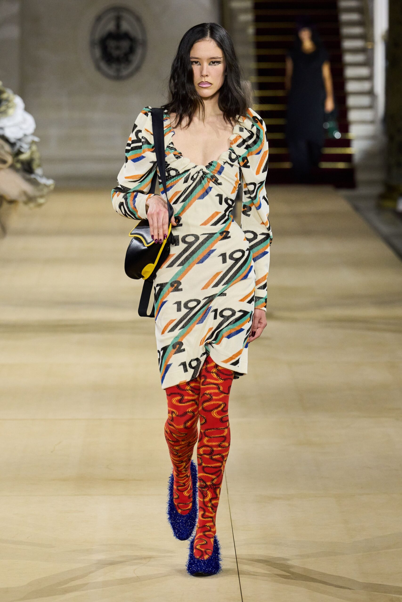 printed mini dress with red boots