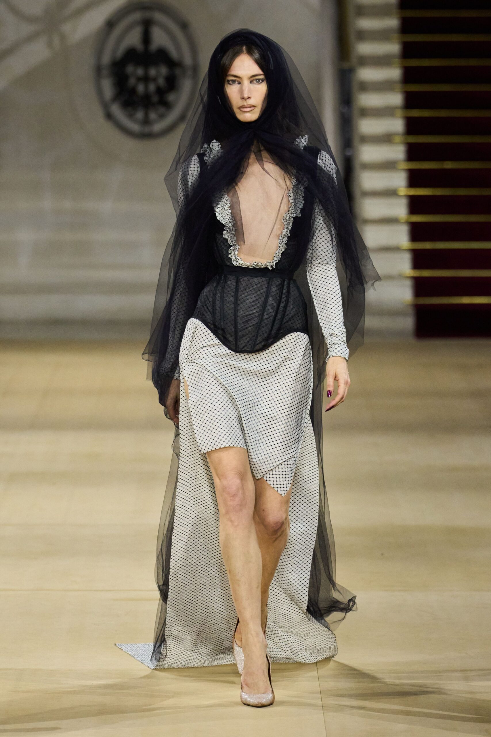 black and white fitted gown with veil