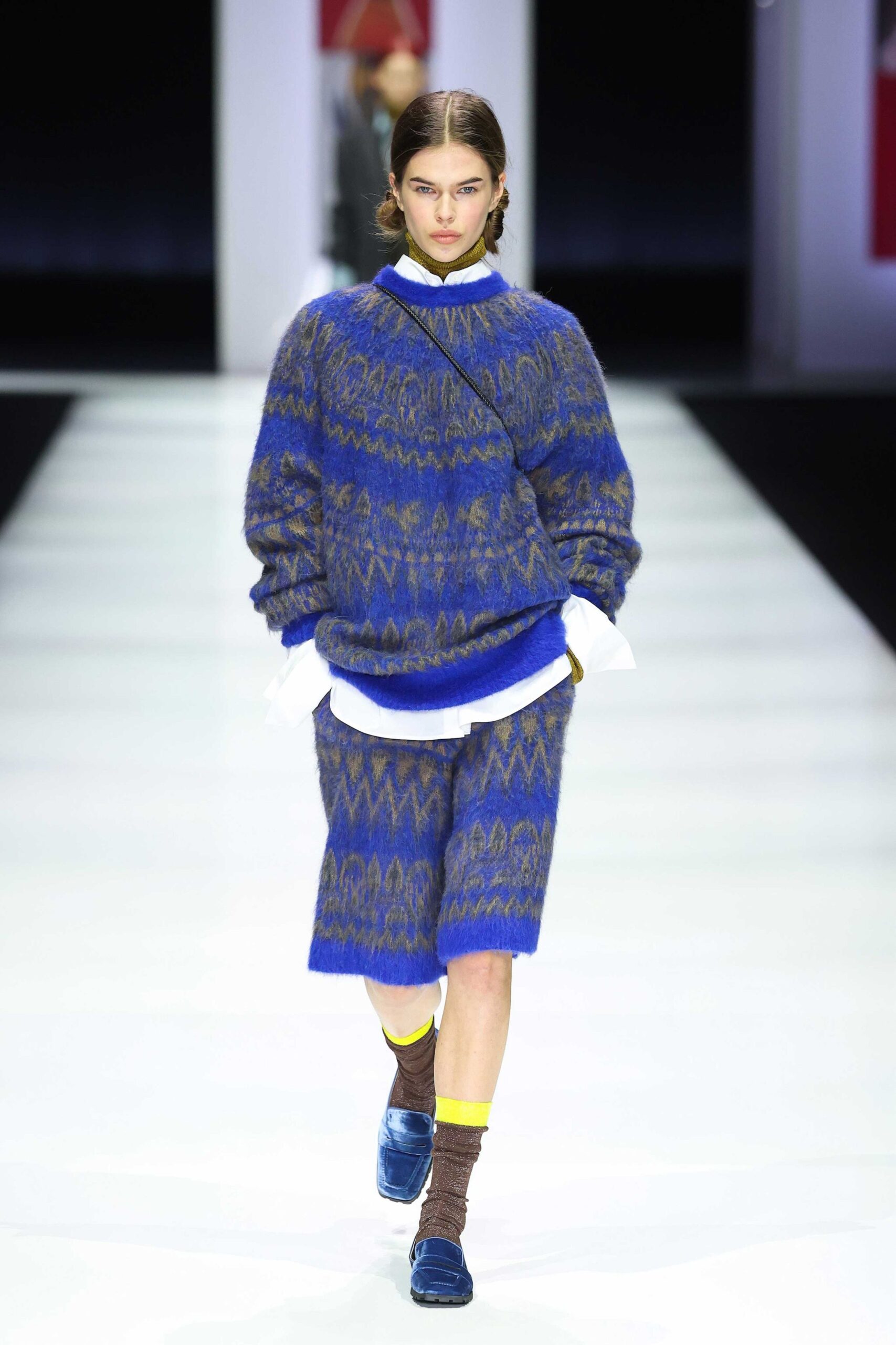 blue patterned sweater and shorts