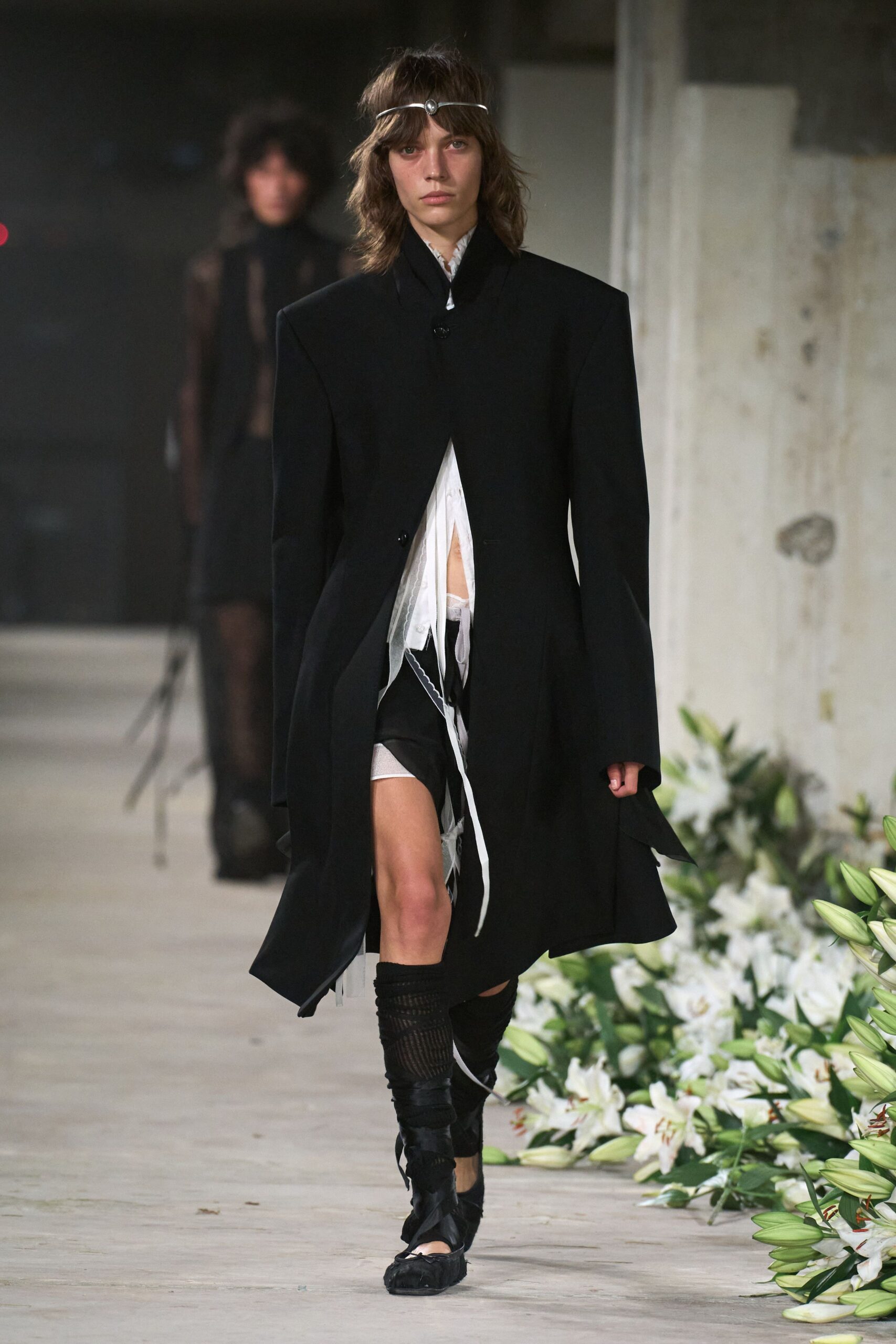 black coat over white dress