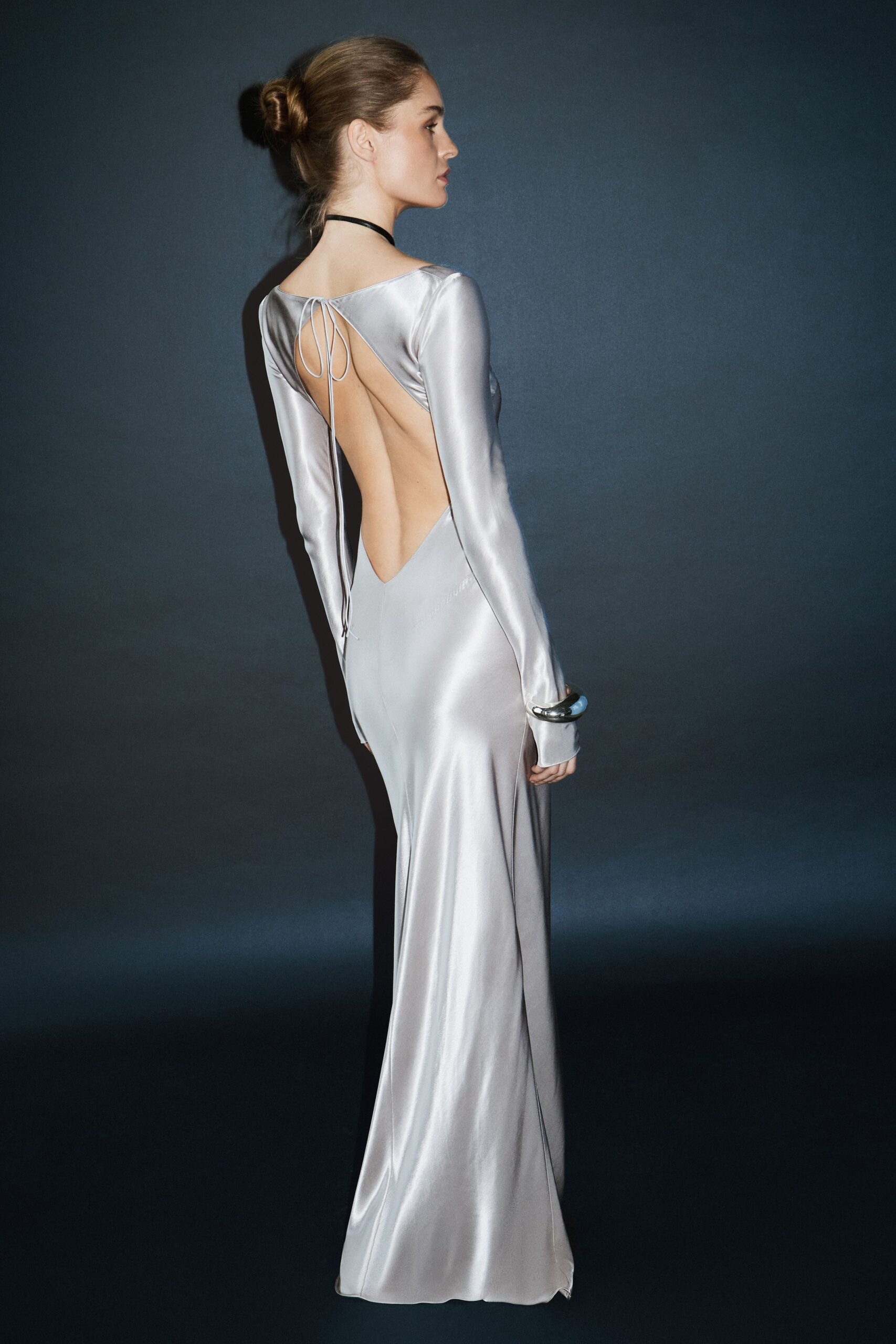 white satin long-sleeve backless fitted draped shiny gown