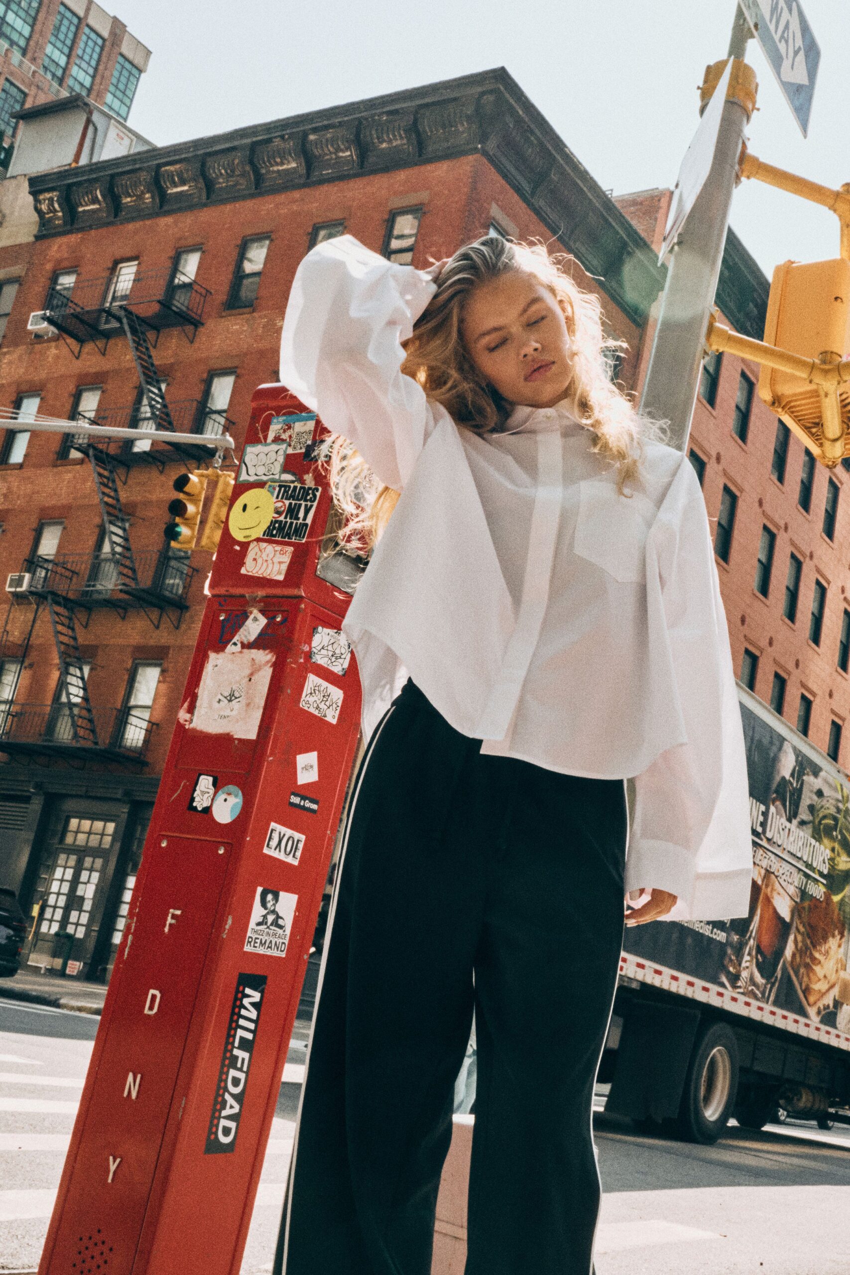 white relaxed shirt and black pants