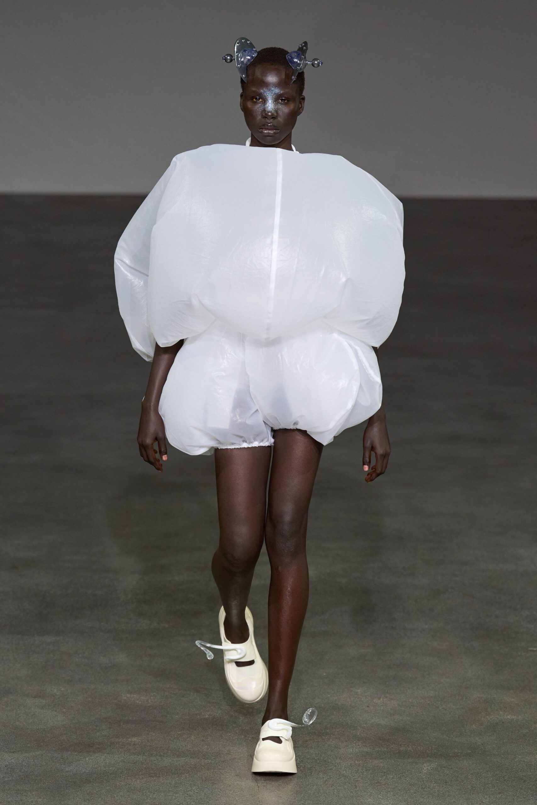white vinyl short-sleeve relaxed padded shiny short dress