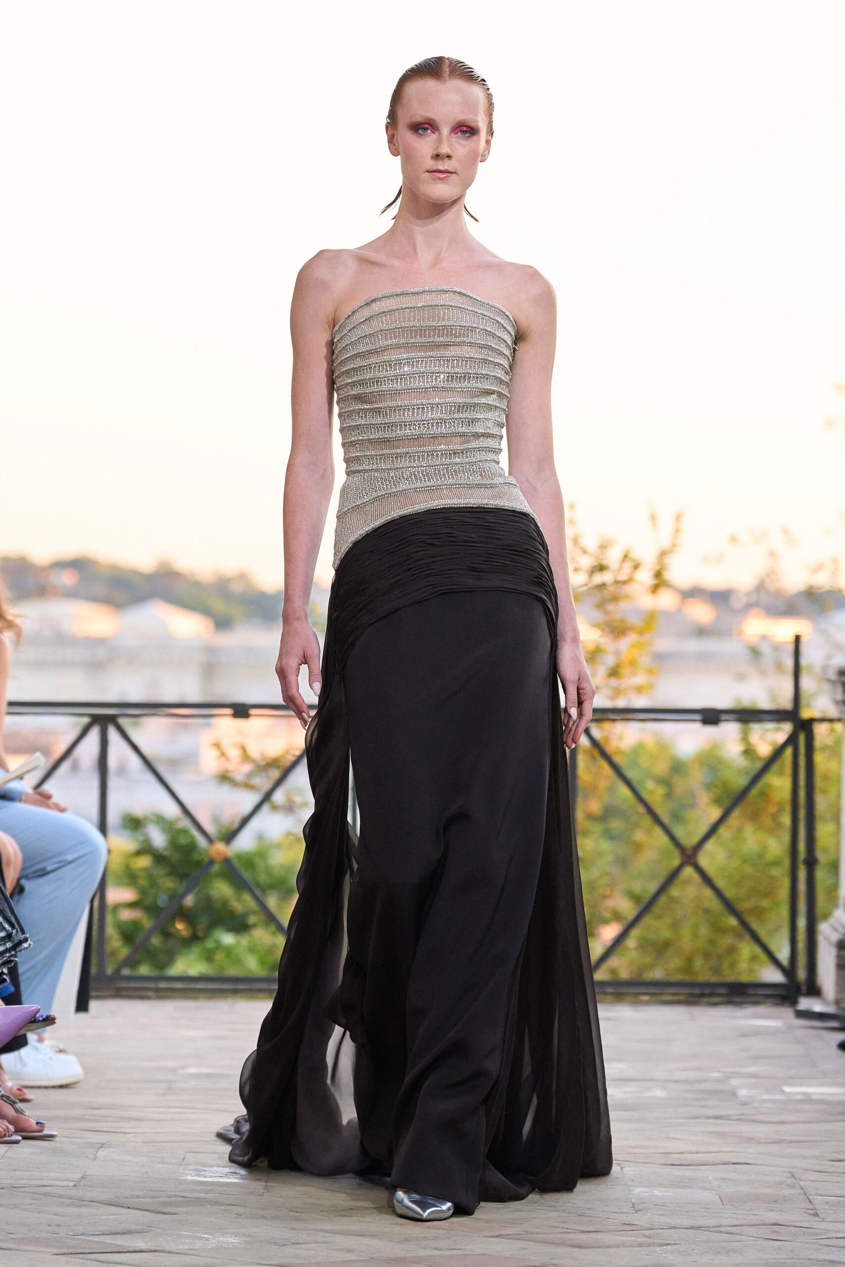 black strapless flowing gown
