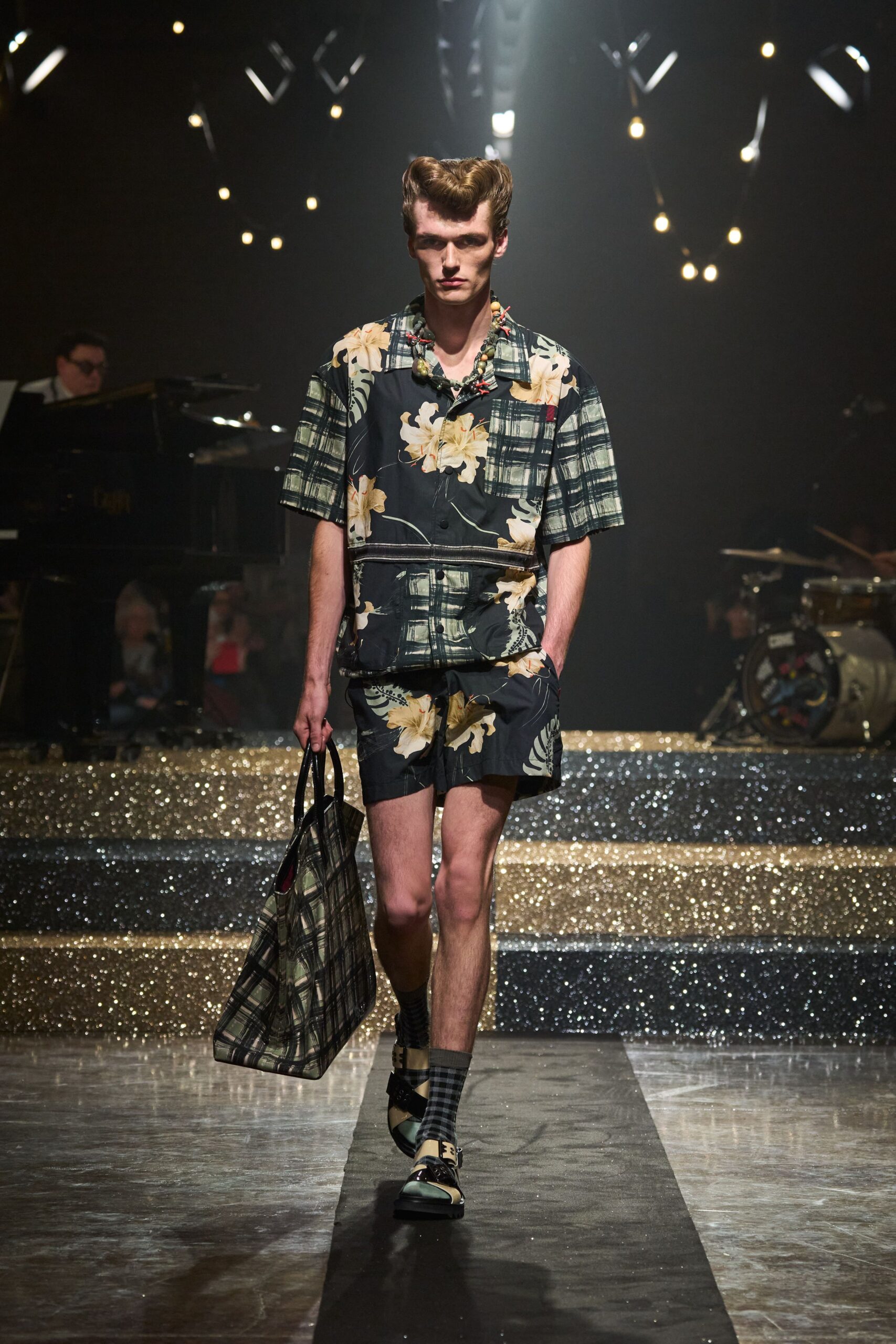 black and beige floral shirt and shorts