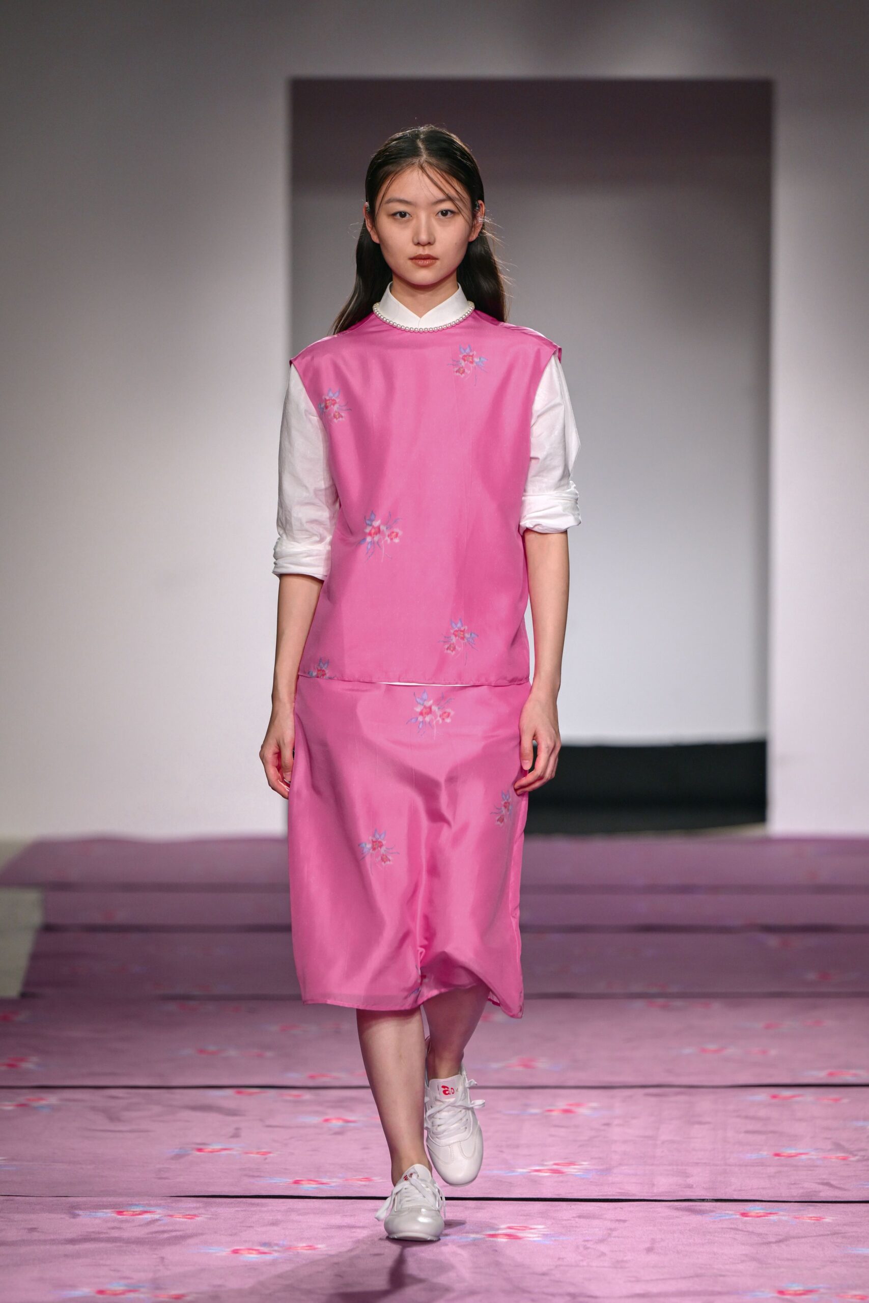 pink embroidered midi dress with white shoes