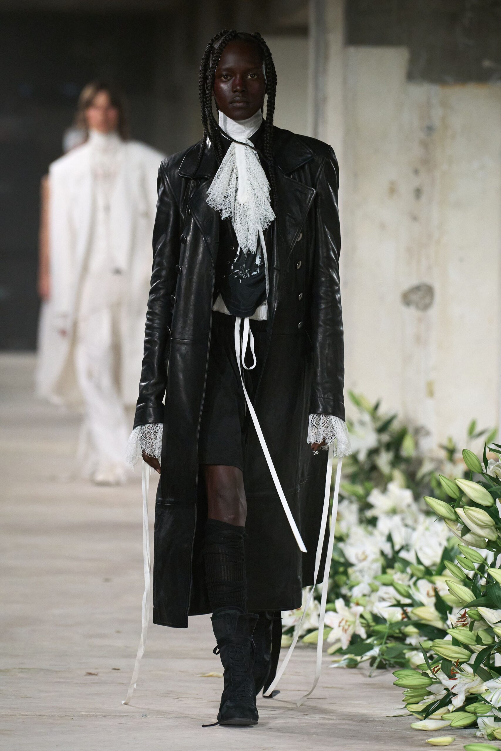 black leather coat with white blouse