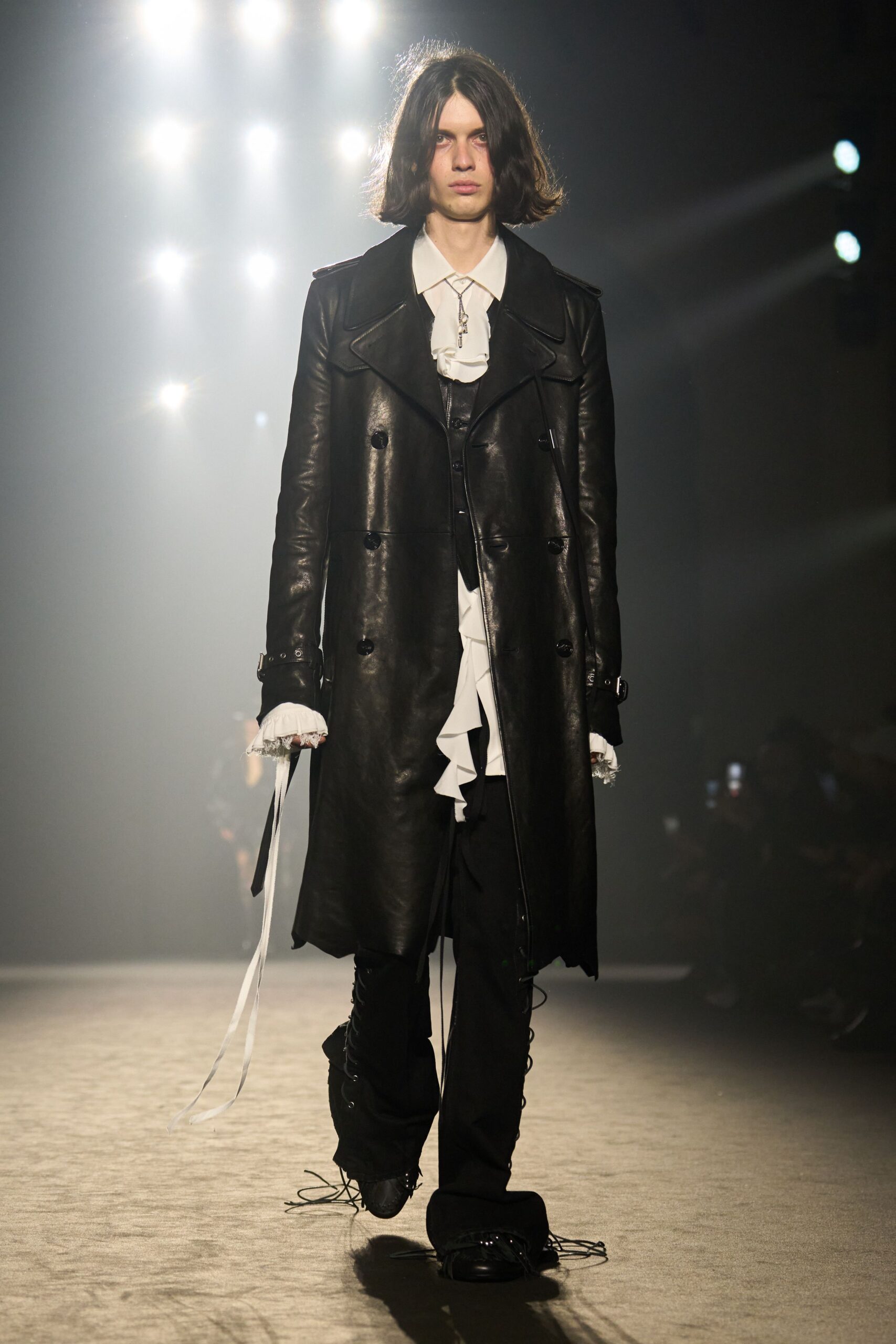 black leather coat with ruffled shirt