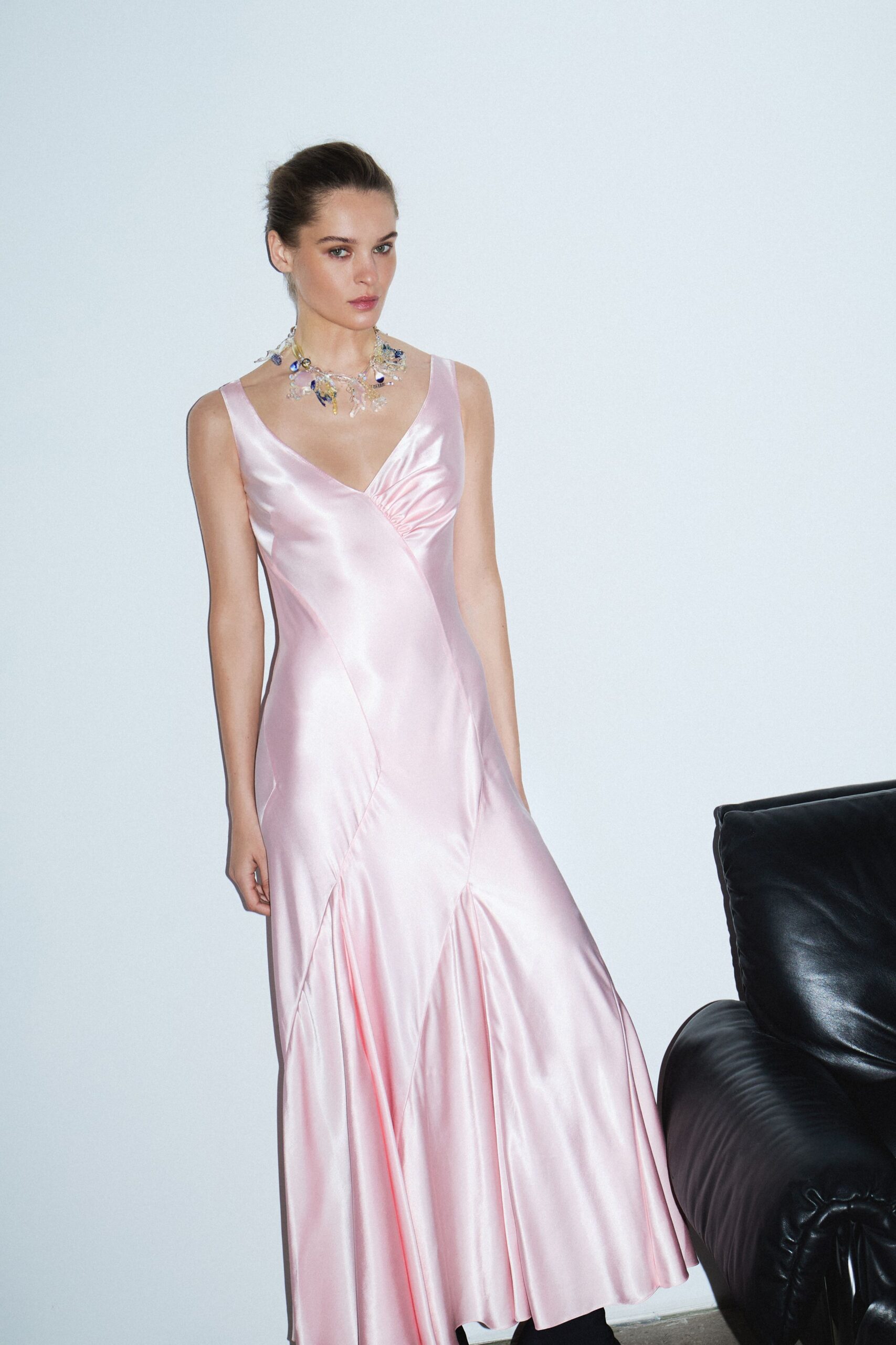 pink satin sleeveless v-neck fitted draped shiny gown