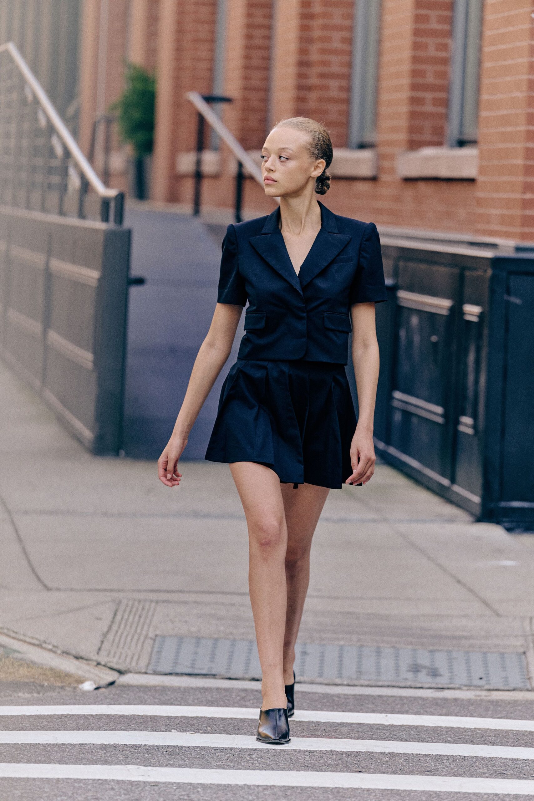 black cotton short-sleeve collared fitted buttoned blazer