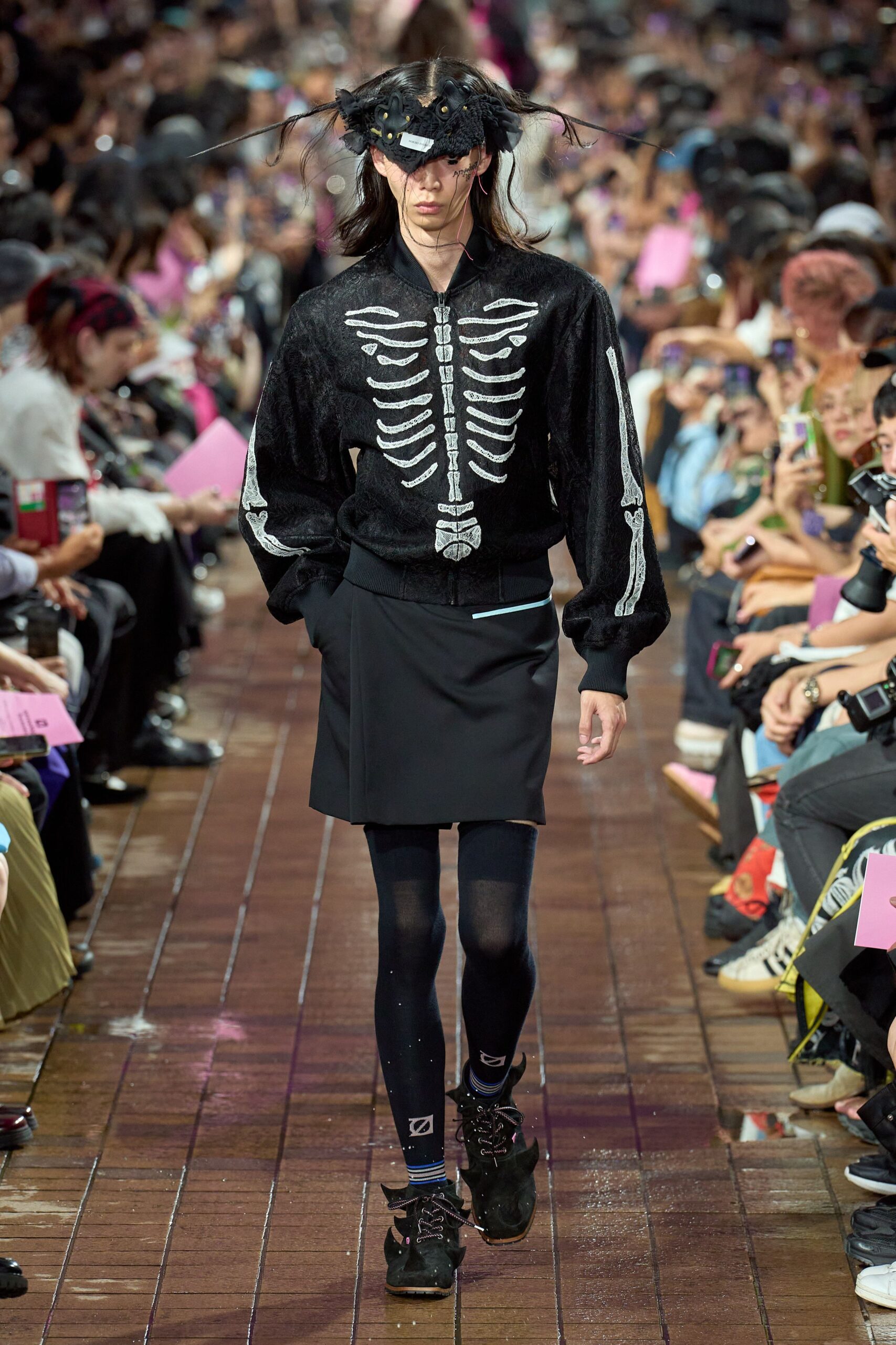black relaxed sweater with skeleton print