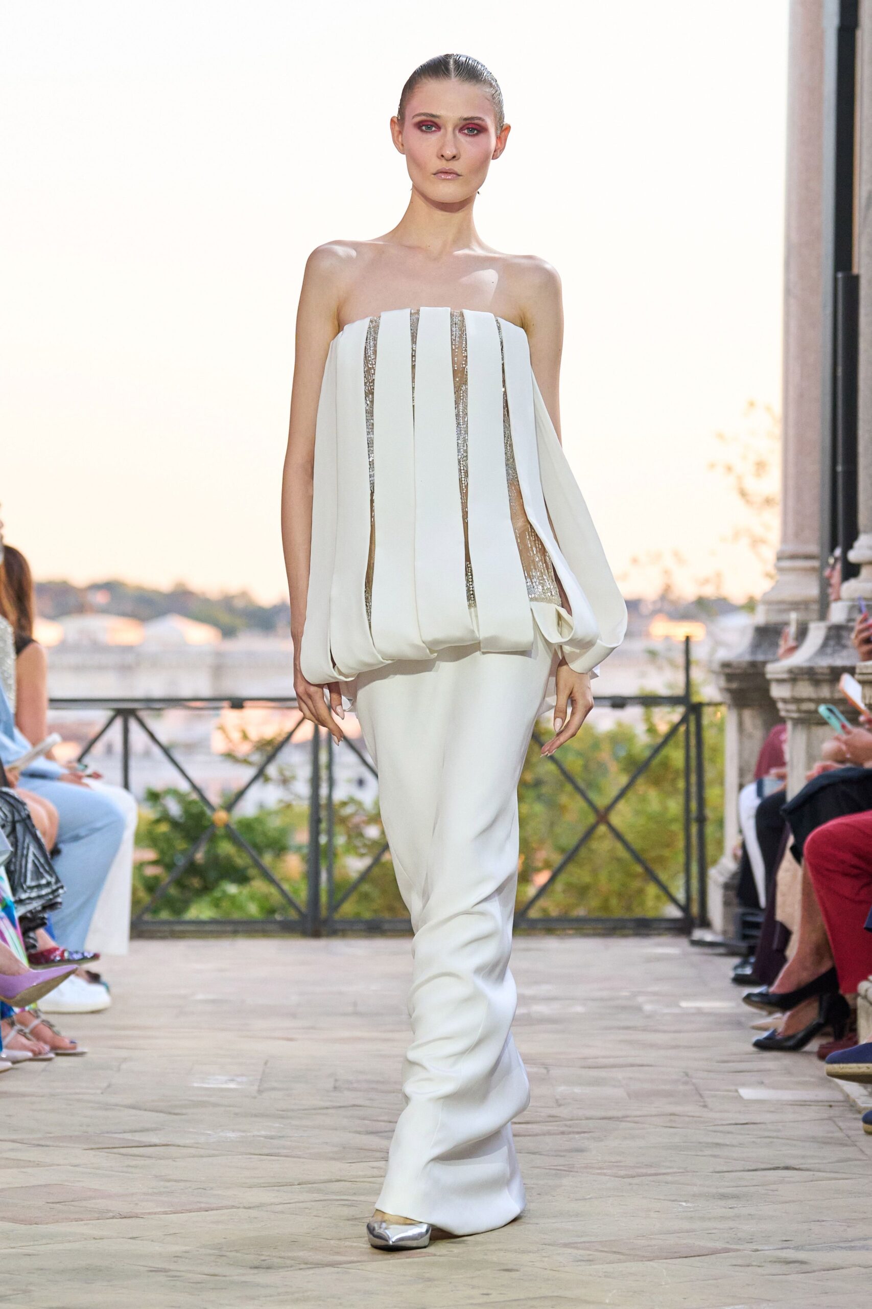white strapless pleated gown