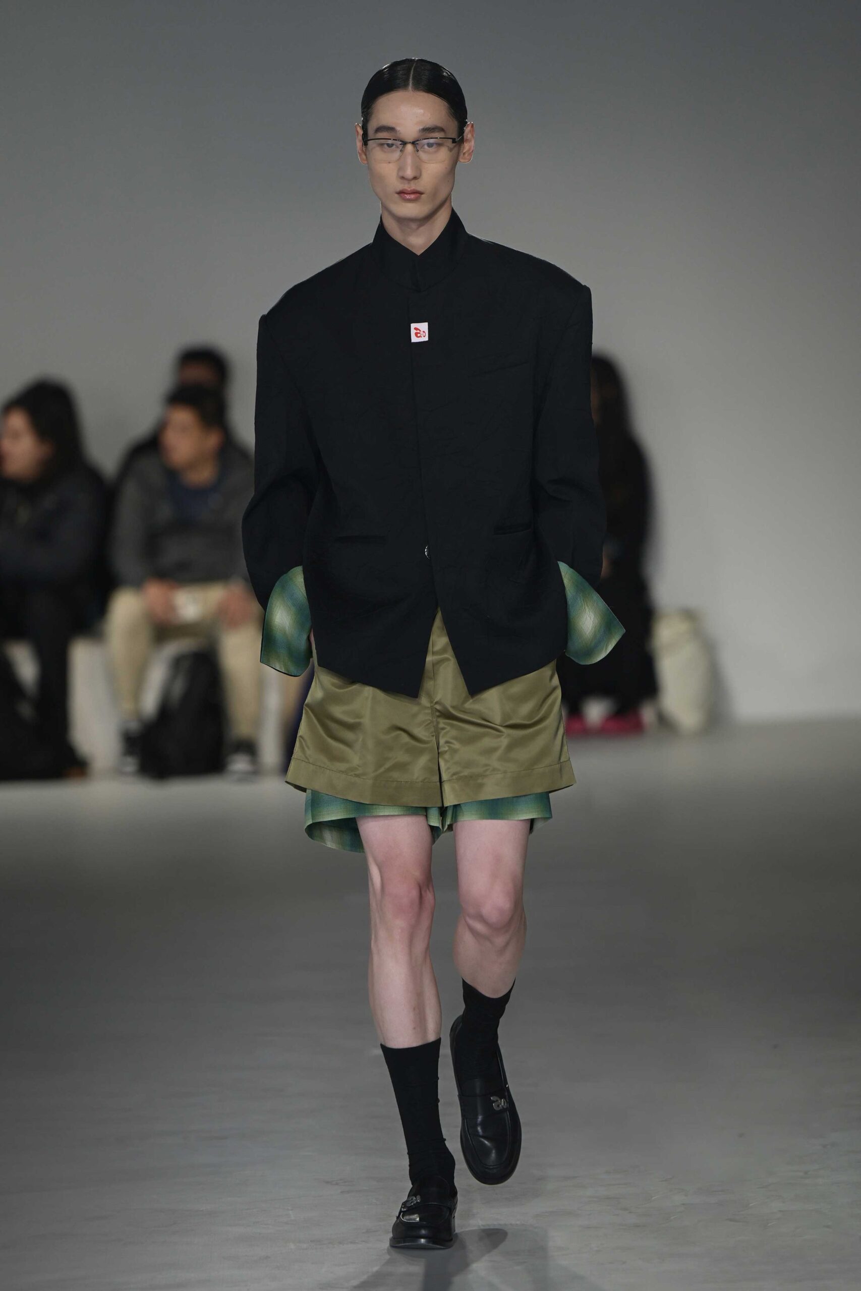 green cotton relaxed pleated short shorts