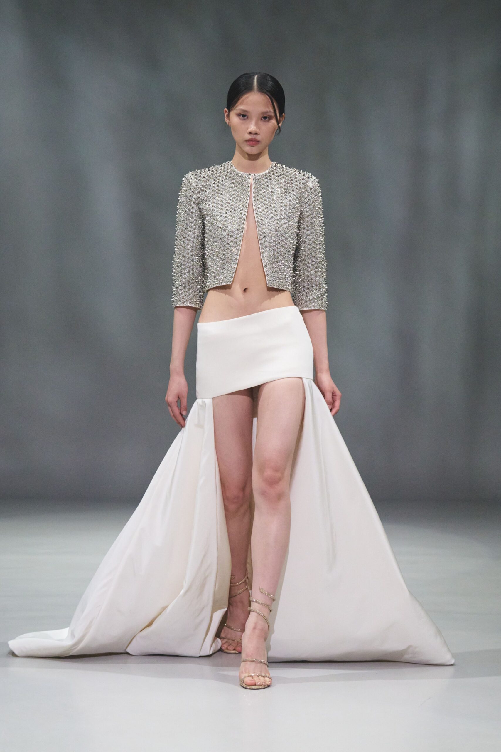 silver beaded top with white skirt