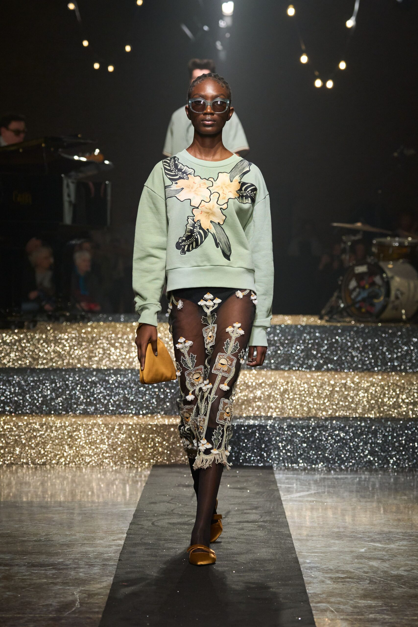 green embroidered sweater with mesh pants