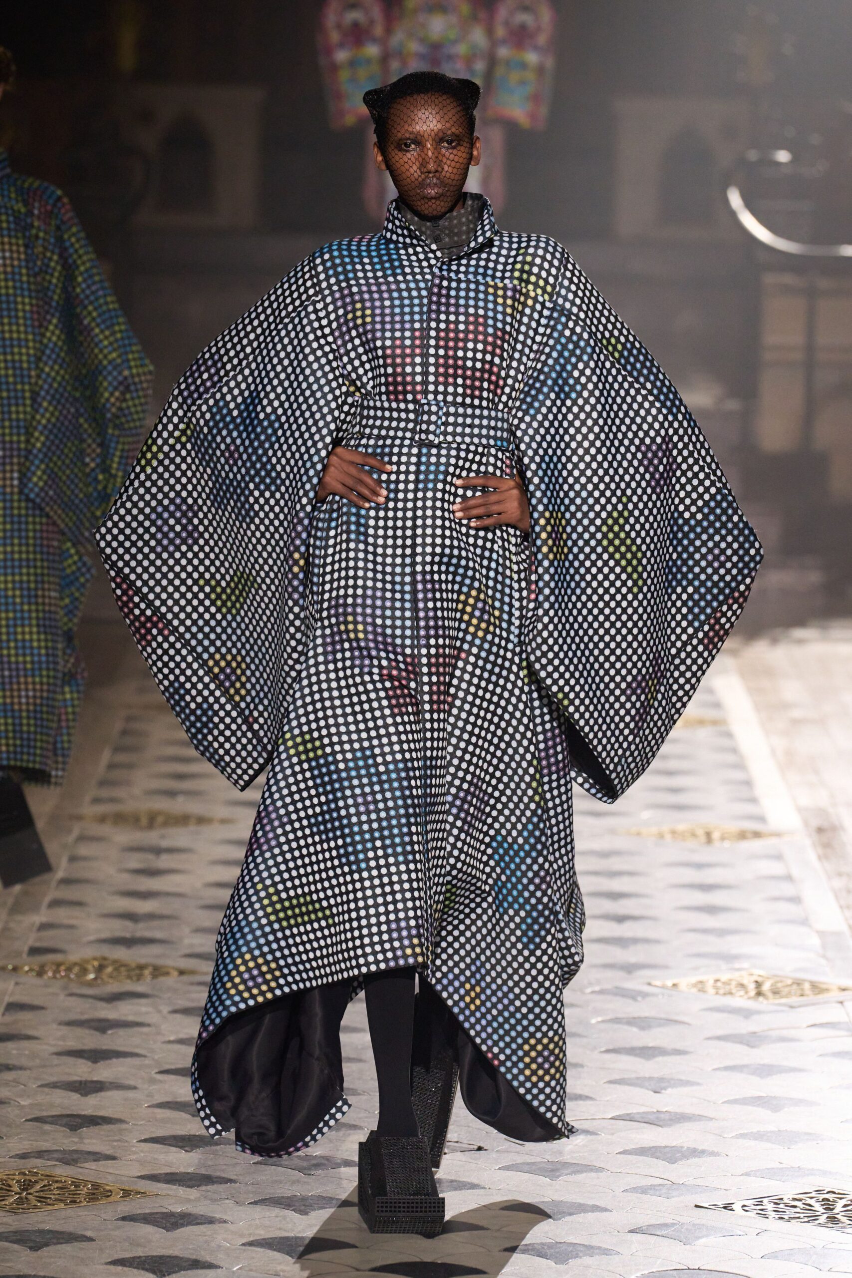 black cotton long-sleeve collared relaxed printed cape