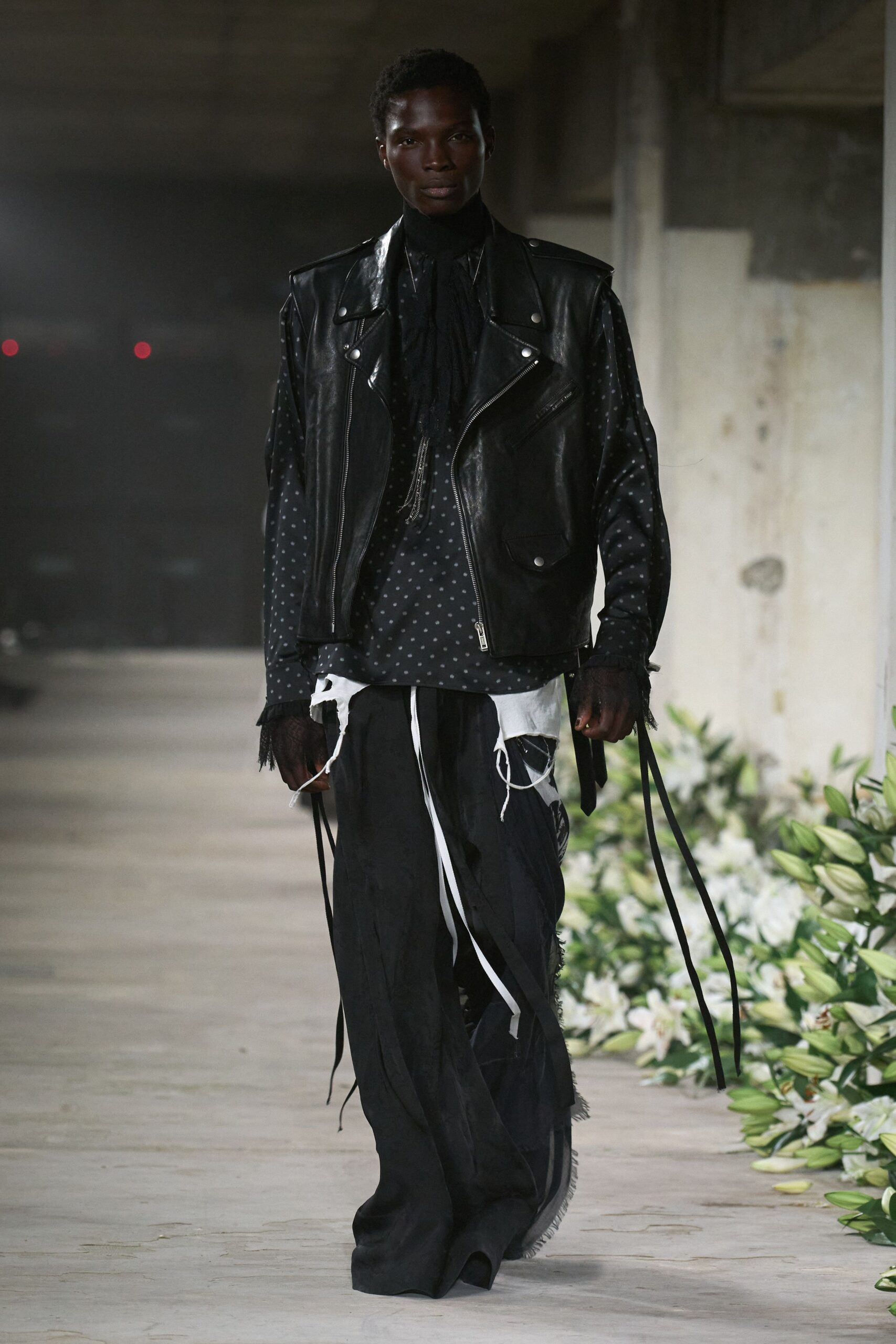 black leather jacket and relaxed pants