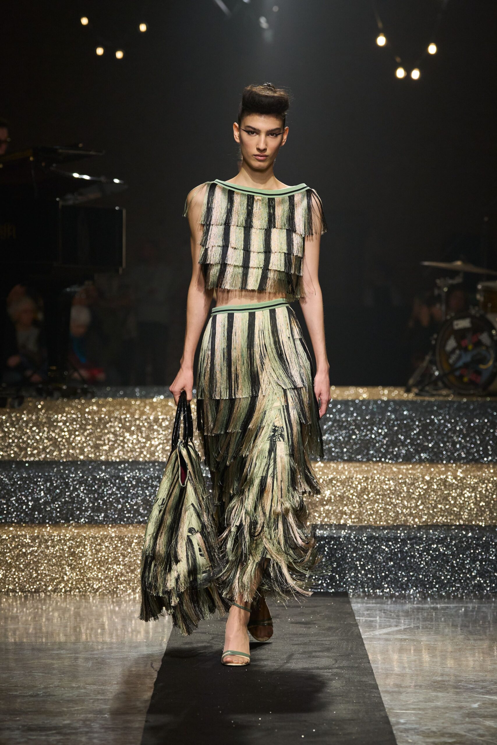 fringed green and beige outfit