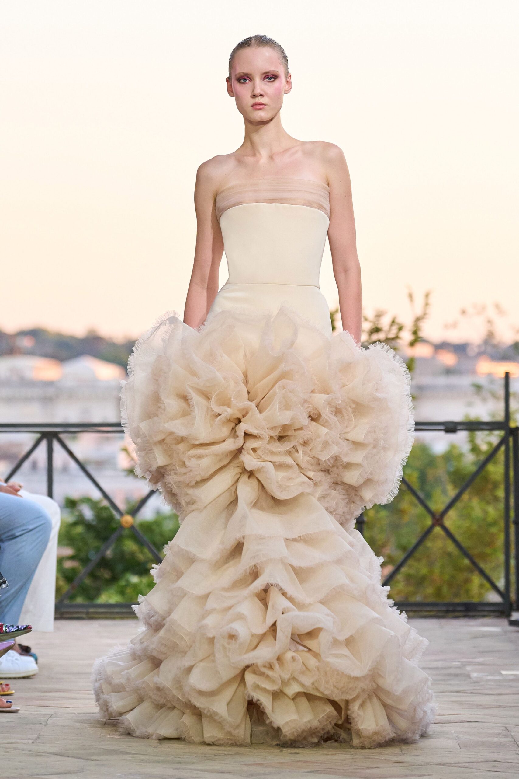 beige strapless ruffled gown