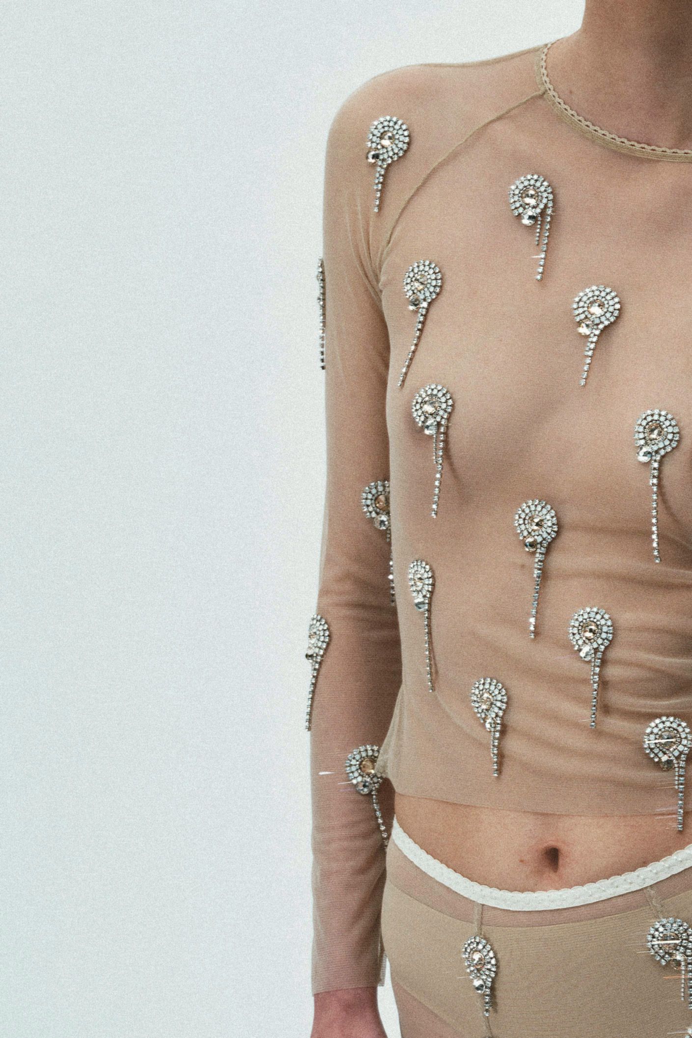 beige embellished fitted top and pants