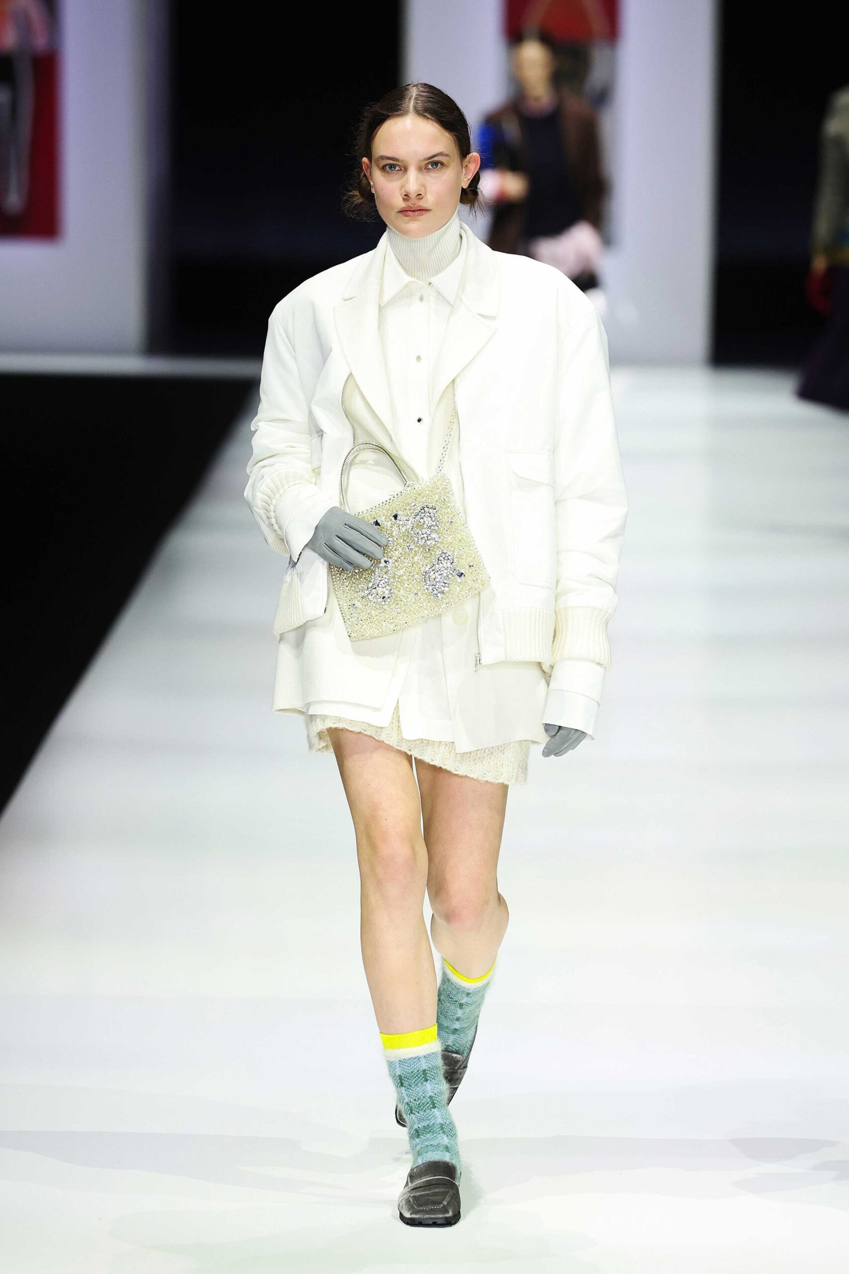 white oversized jacket with pleated skirt