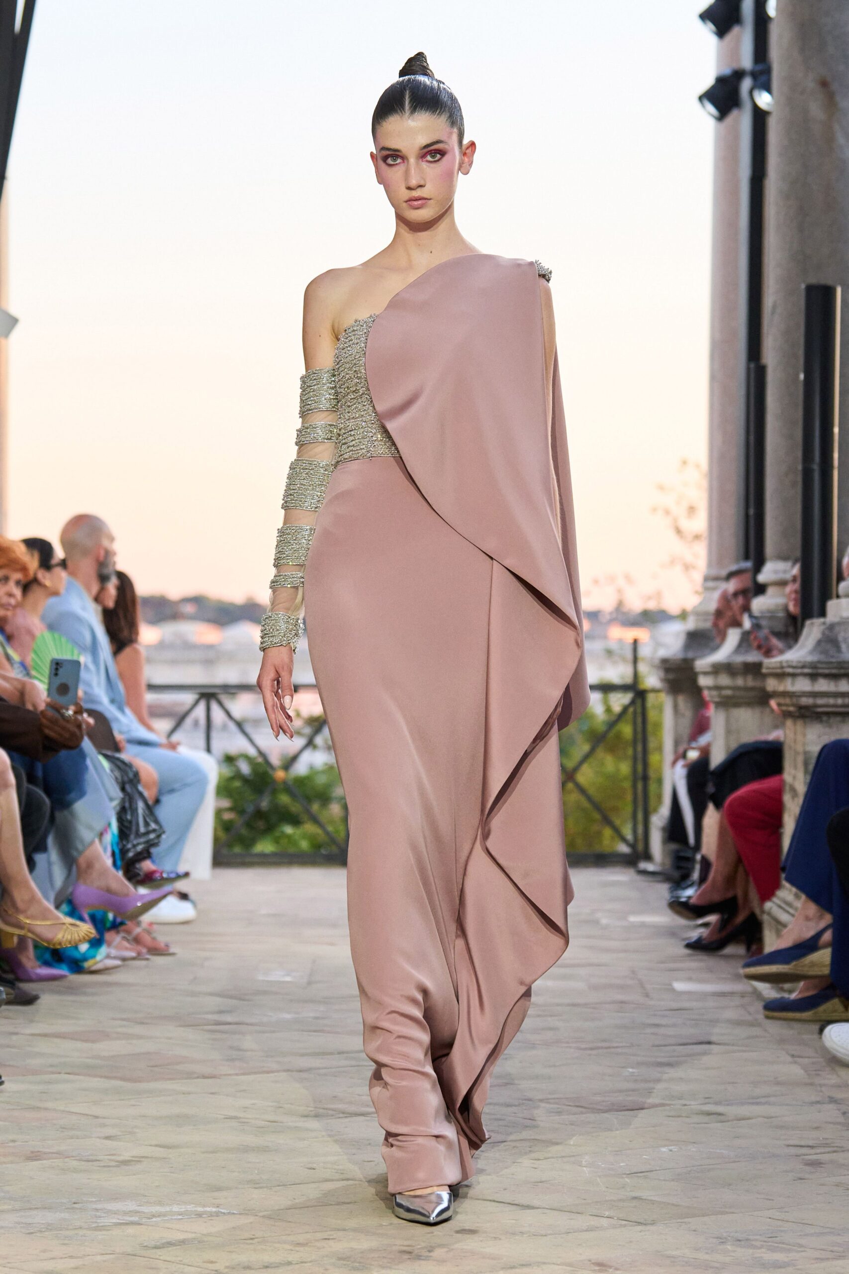 pink silk sleeveless off-shoulder fitted draped flowing gown