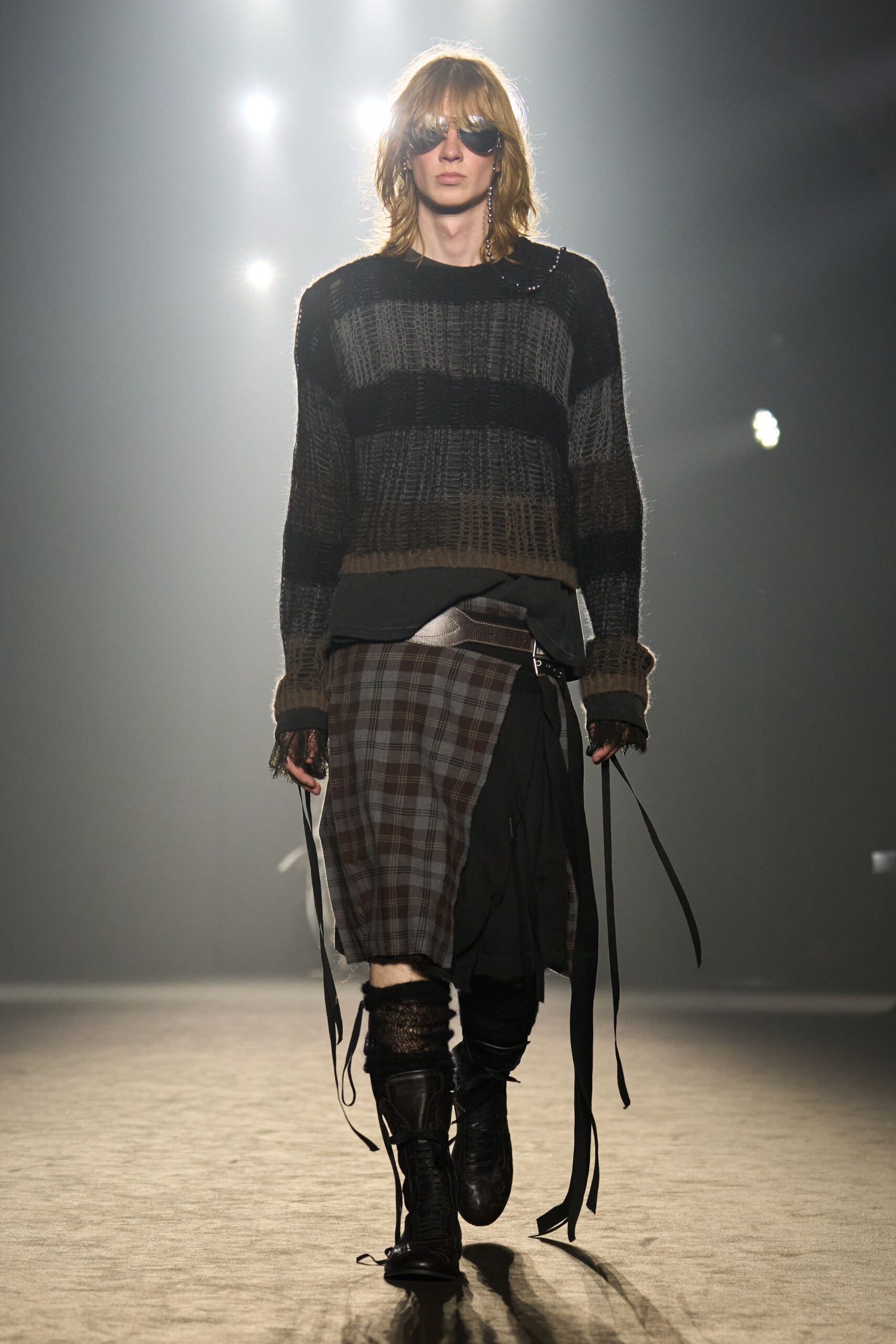 relaxed black wool sweater with plaid skirt