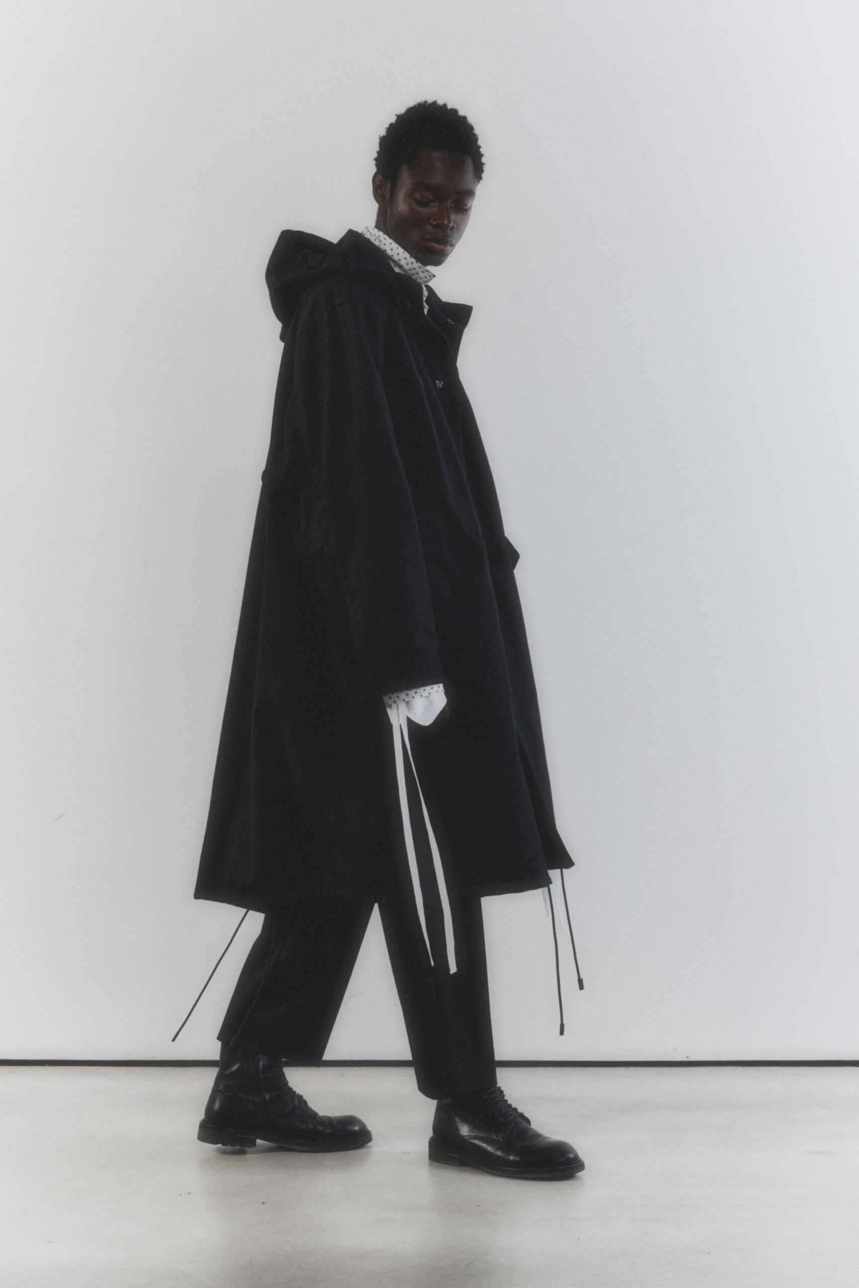black wool long-sleeve hooded oversized buttoned pockets coat