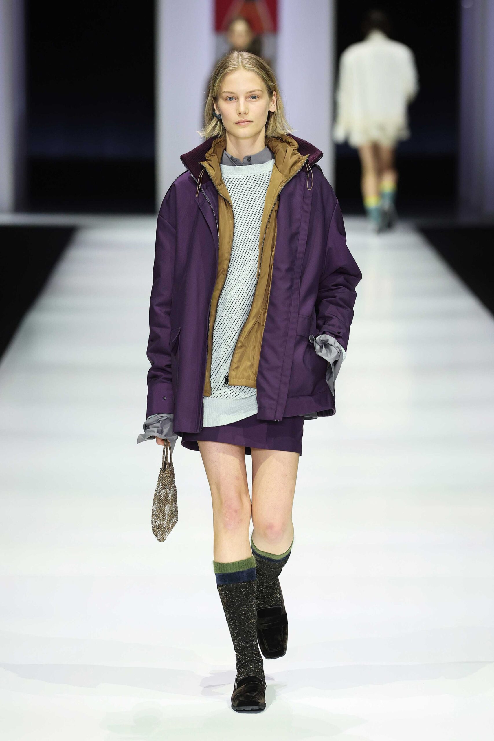 purple jacket gray top short skirt