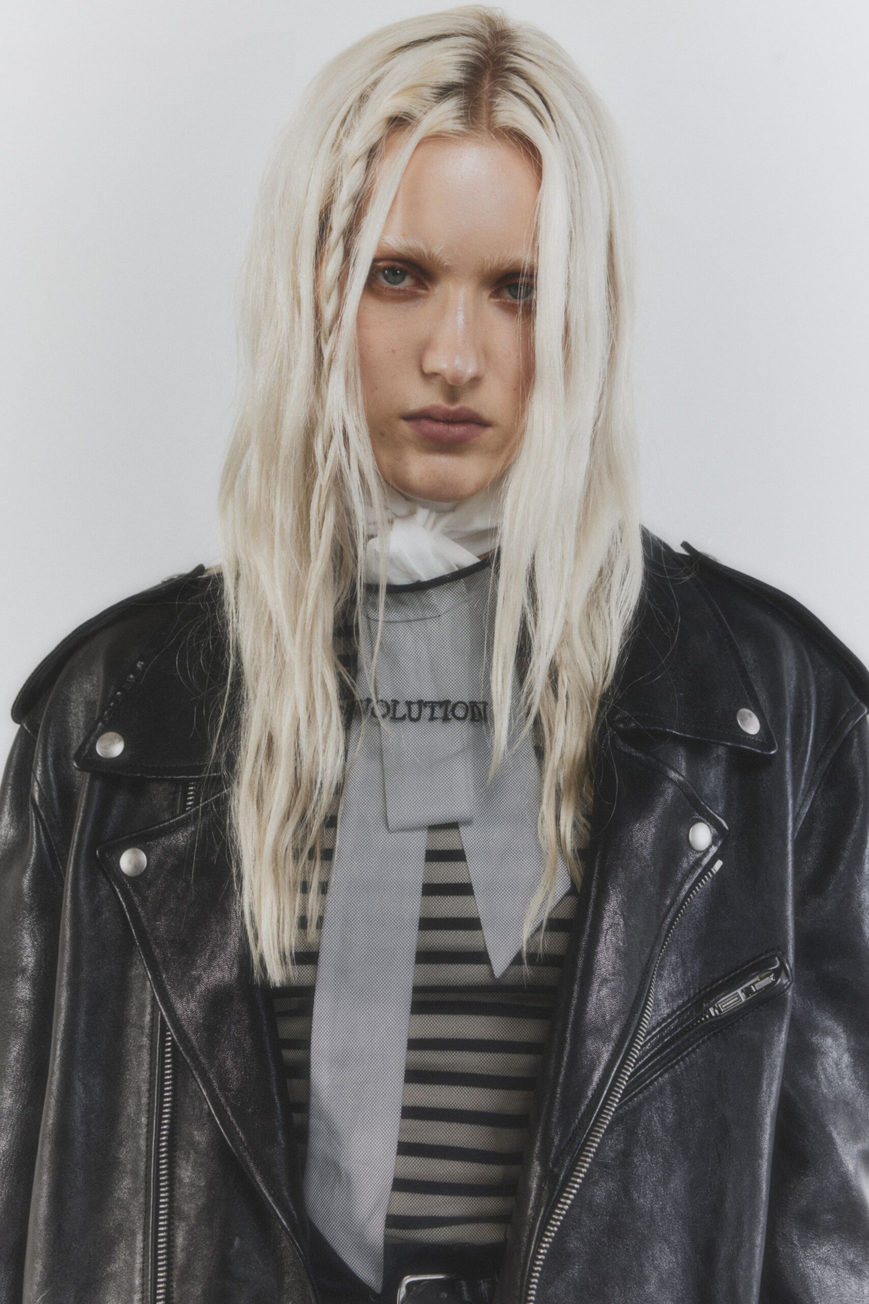 black leather long-sleeve collared oversized zippered pockets jacket