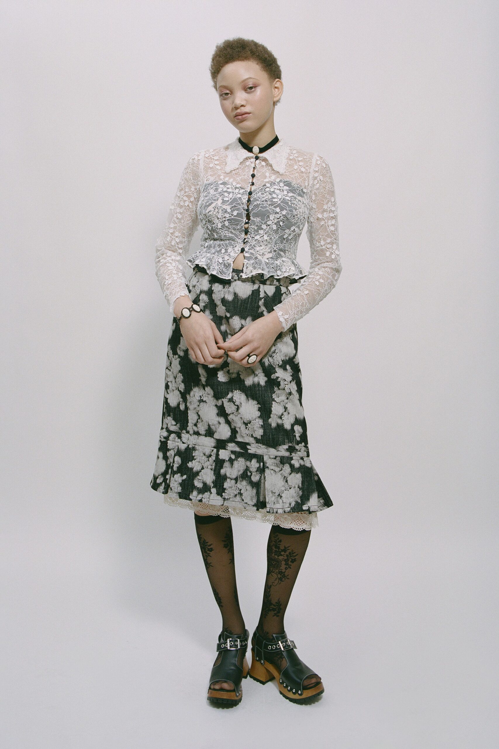 white lace long-sleeve collared fitted buttoned embellished blouse