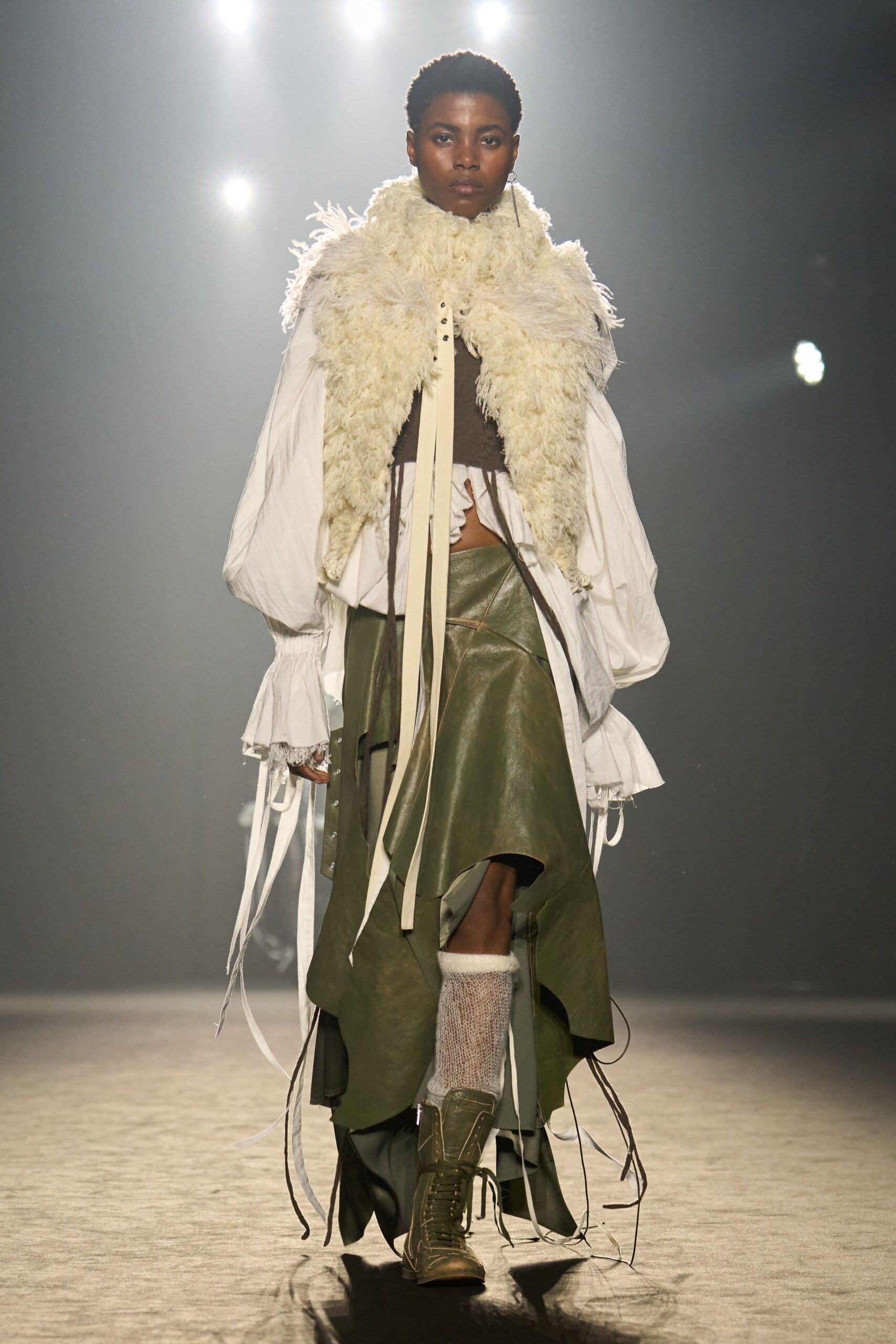 green leather asymmetric fitted pleated skirt