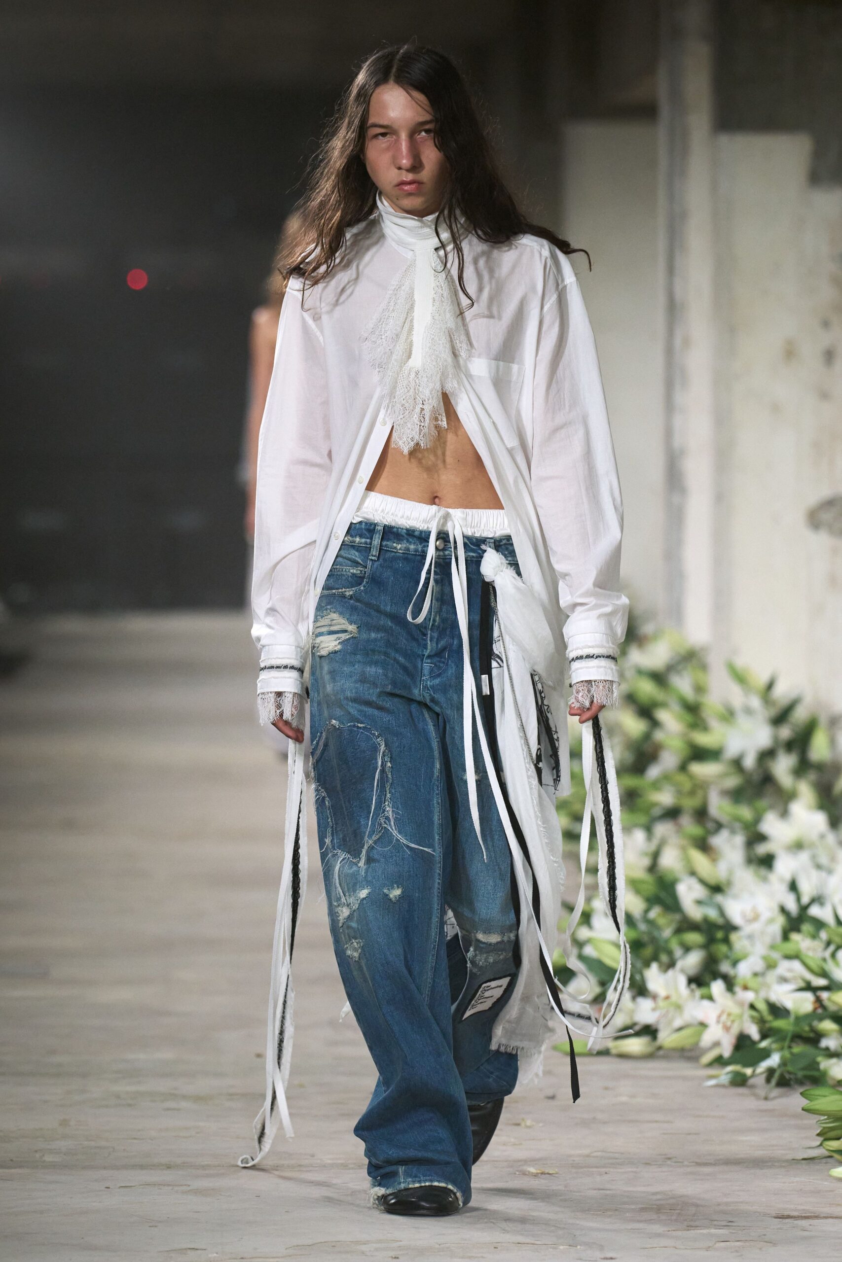 white relaxed shirt with blue pants