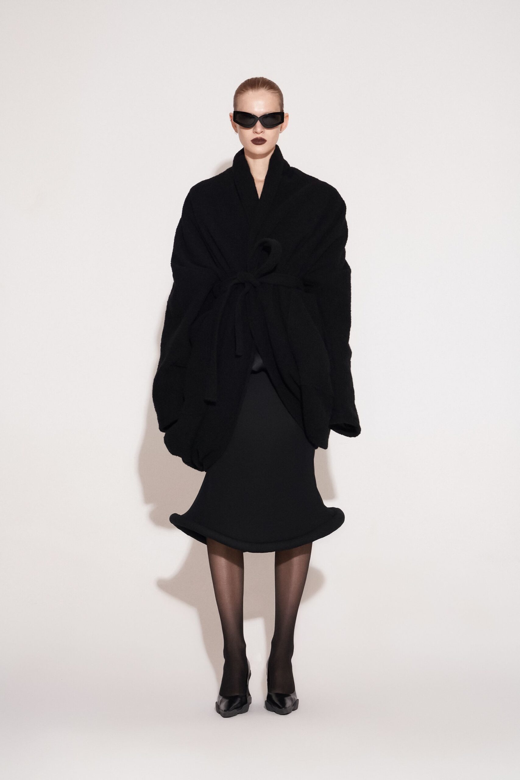 black wool oversized draped coat